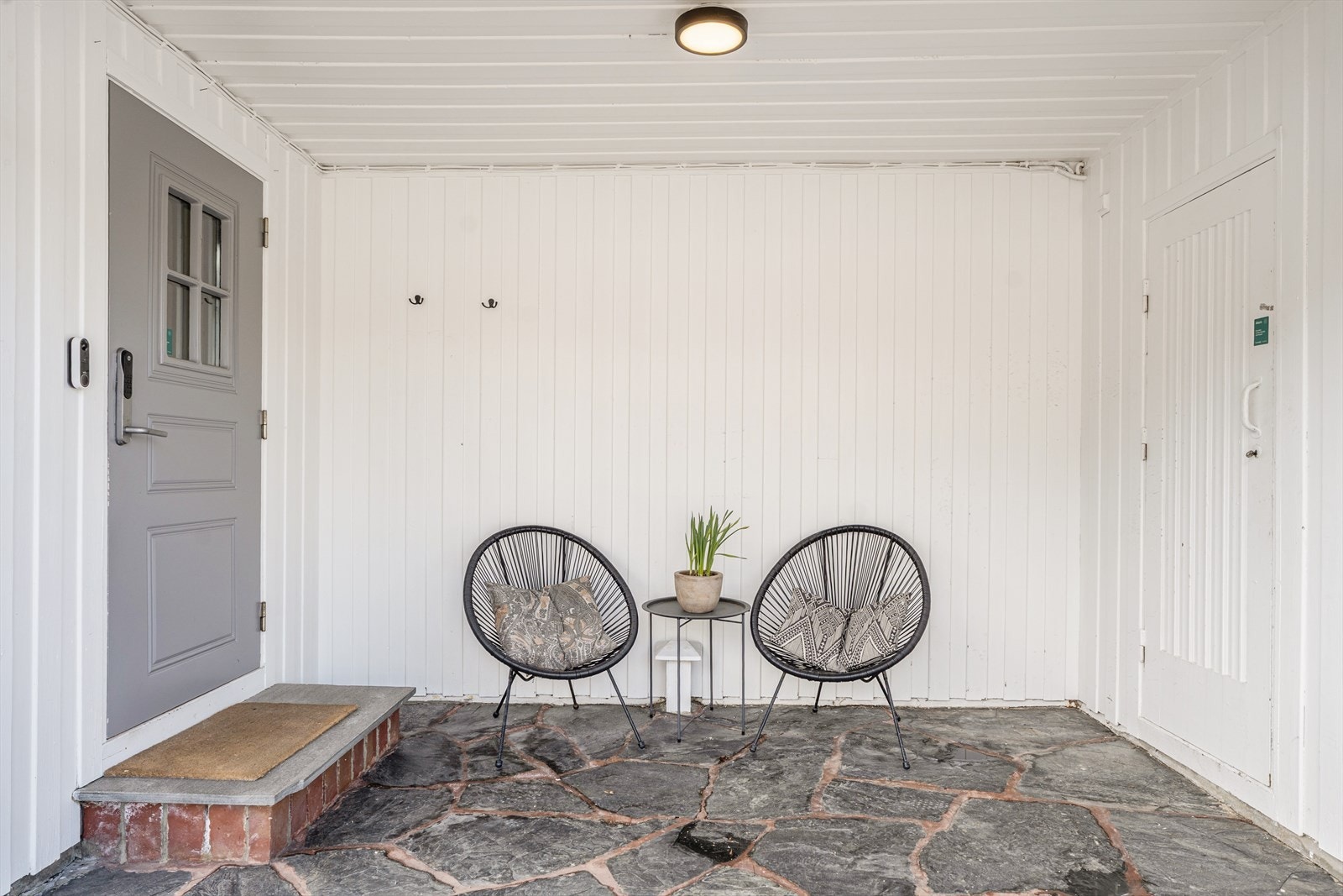 Pent overbygget inngangsparti Galleribilde