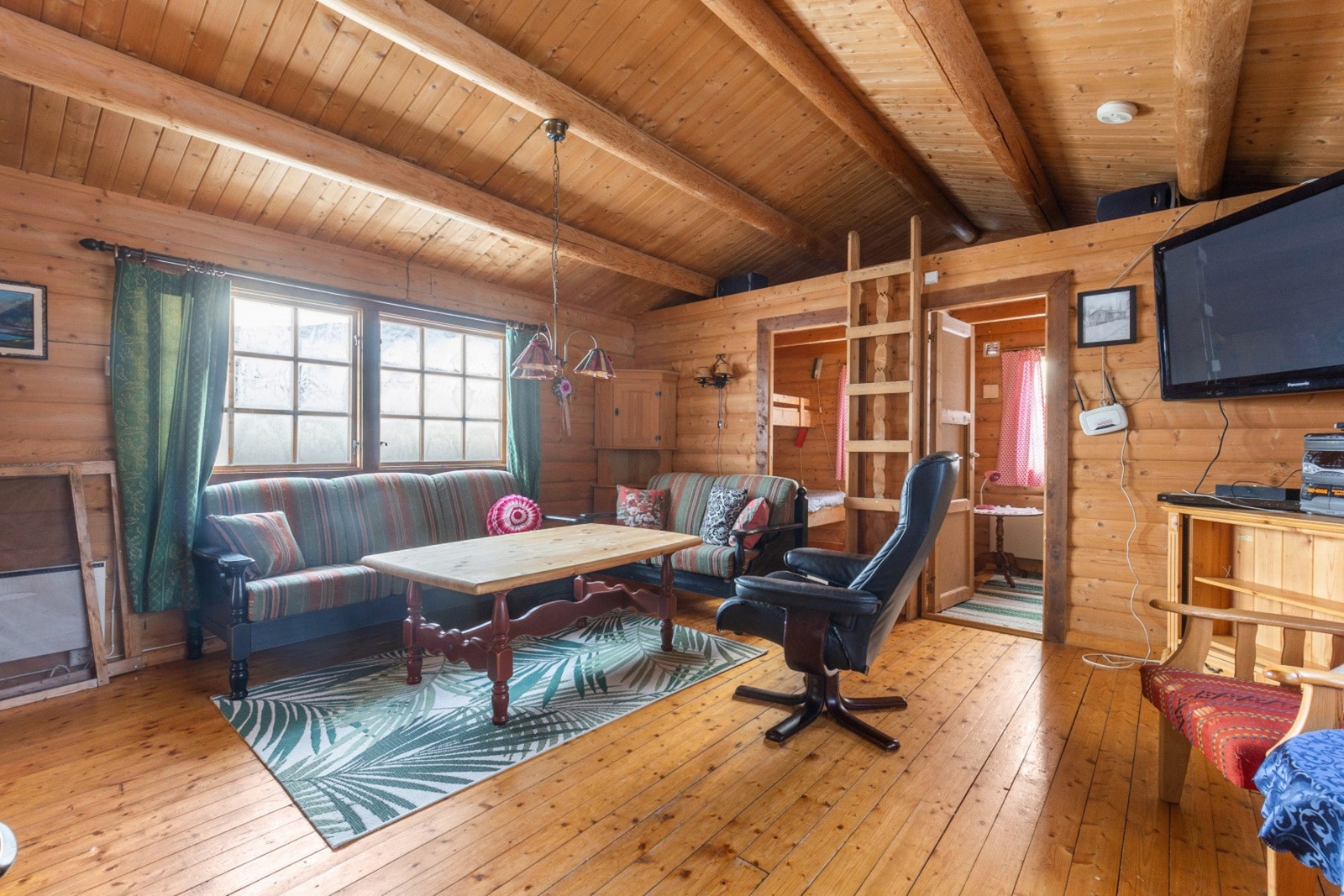 Inviter venner og familie til denne koselige hytten Galleribilde