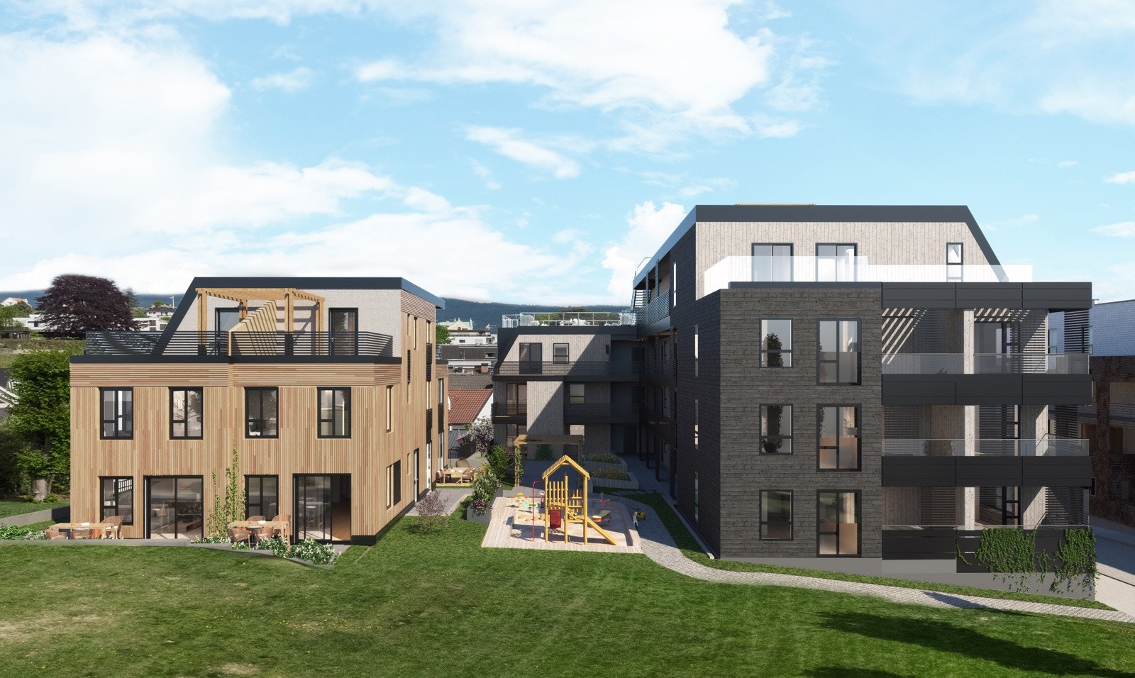 Den grønne intime bakgården mellom byggene blir beplantet med prydbusker og tilrettelagt for sittegrupper og lekeapparater til de minste. Galleribilde