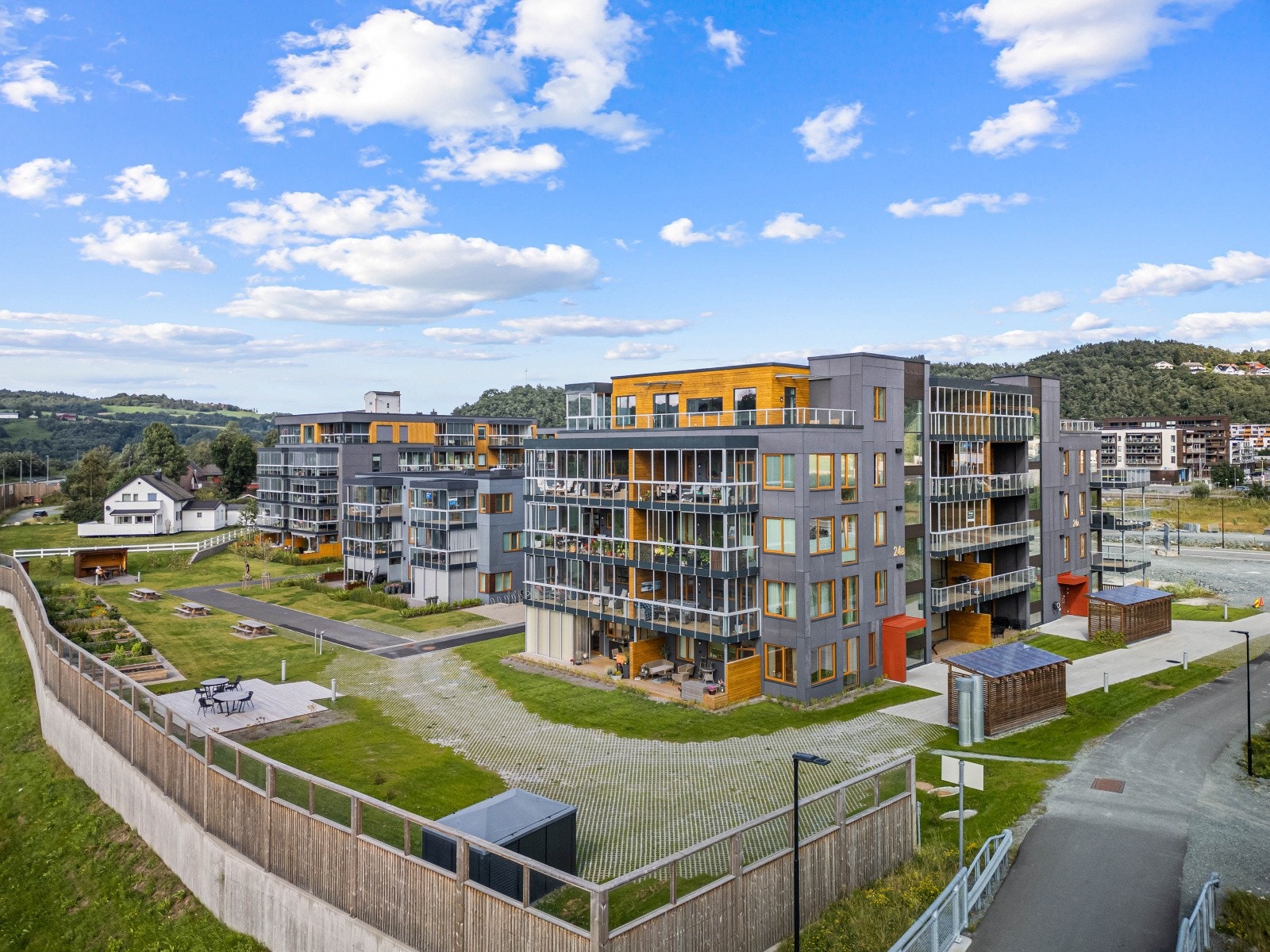 På Melhustunet vil du bo sentrumsnært, men likevel noe tilbaketrukket fra miljøgata. Galleribilde