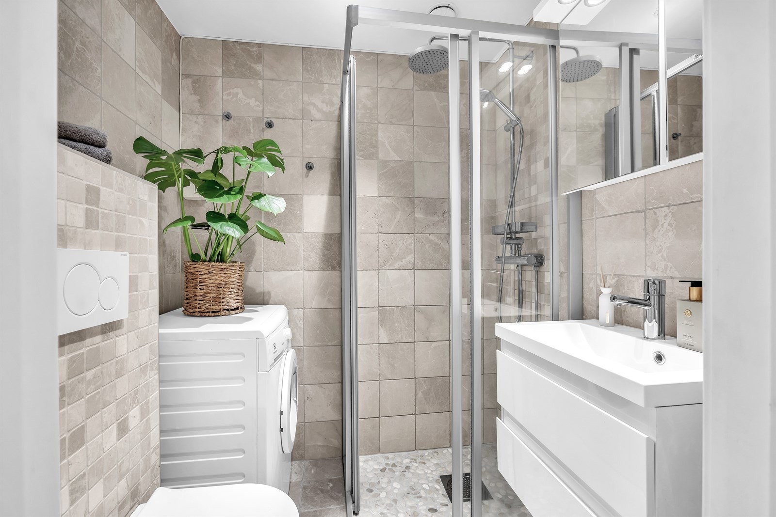 Badet har opplegg for vaskemaskin. Galleribilde