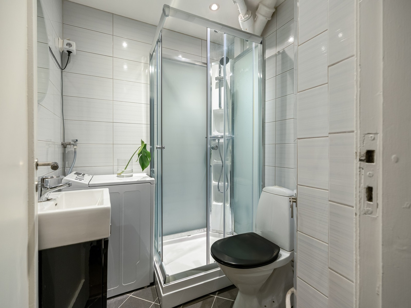 Flislagt baderom med underliggende varme i gulv. Galleribilde