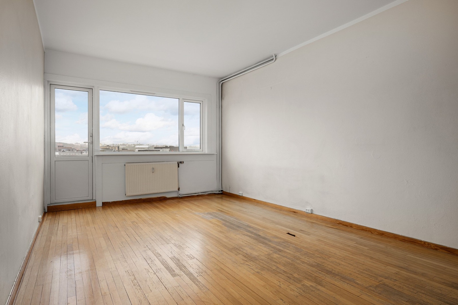 Alle rom i leiligheten har vidstrakt utsikt utover Grünerløkka. Galleribilde