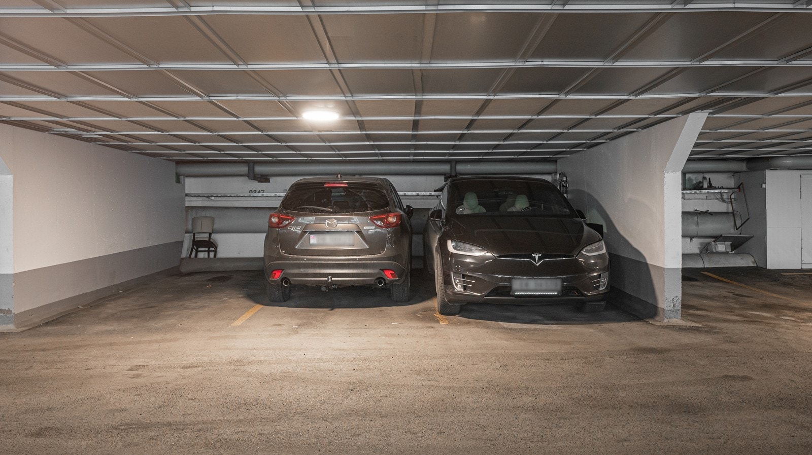 Det følger en garasjeplass med lader, samt gratis gjesteparkering i garasje Galleribilde