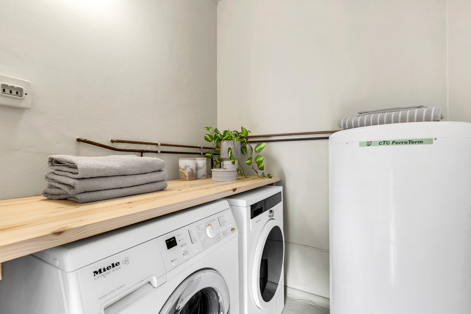 Separat vaskerom er meget praktisk, samt en etterspurt kvalitet i leiligheter. Galleribilde