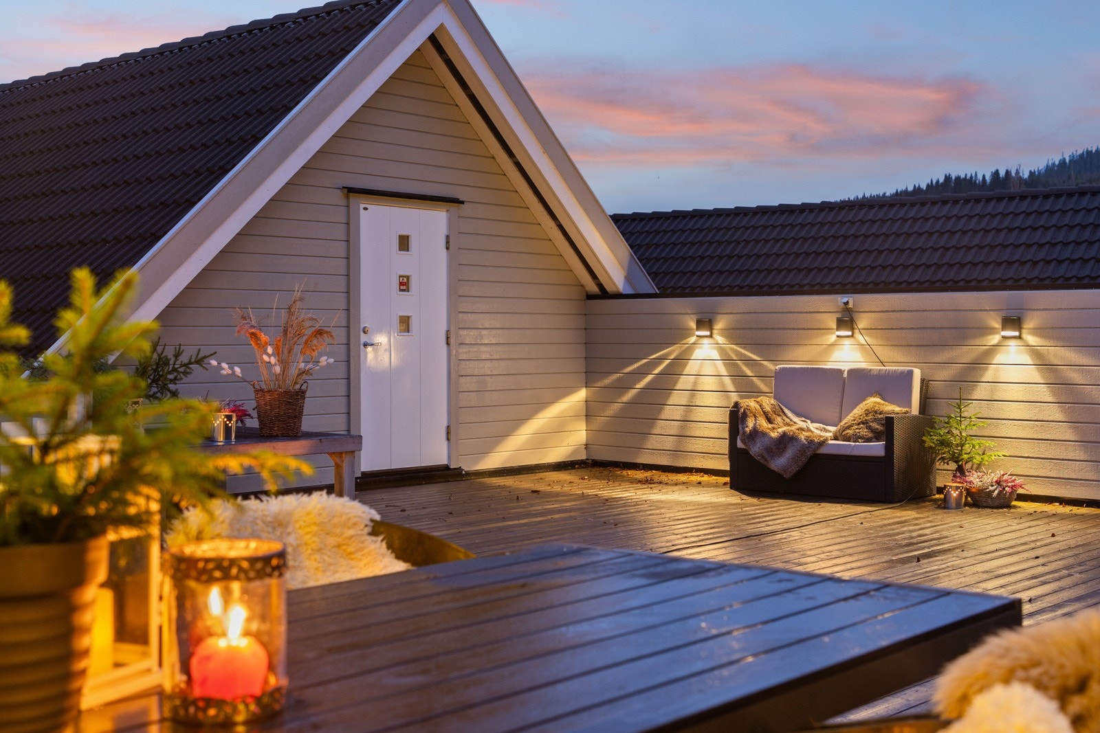 På terrassen kan man invitere hele familien over på en hyggelig sammenkomst. Galleribilde