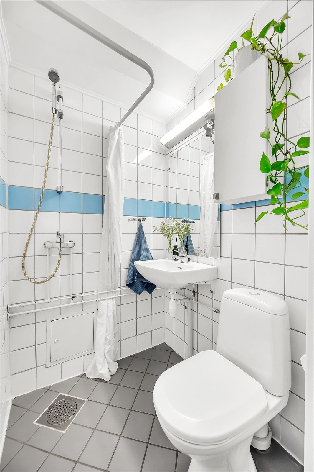 Flislagt bad med gulvvarme. Galleribilde