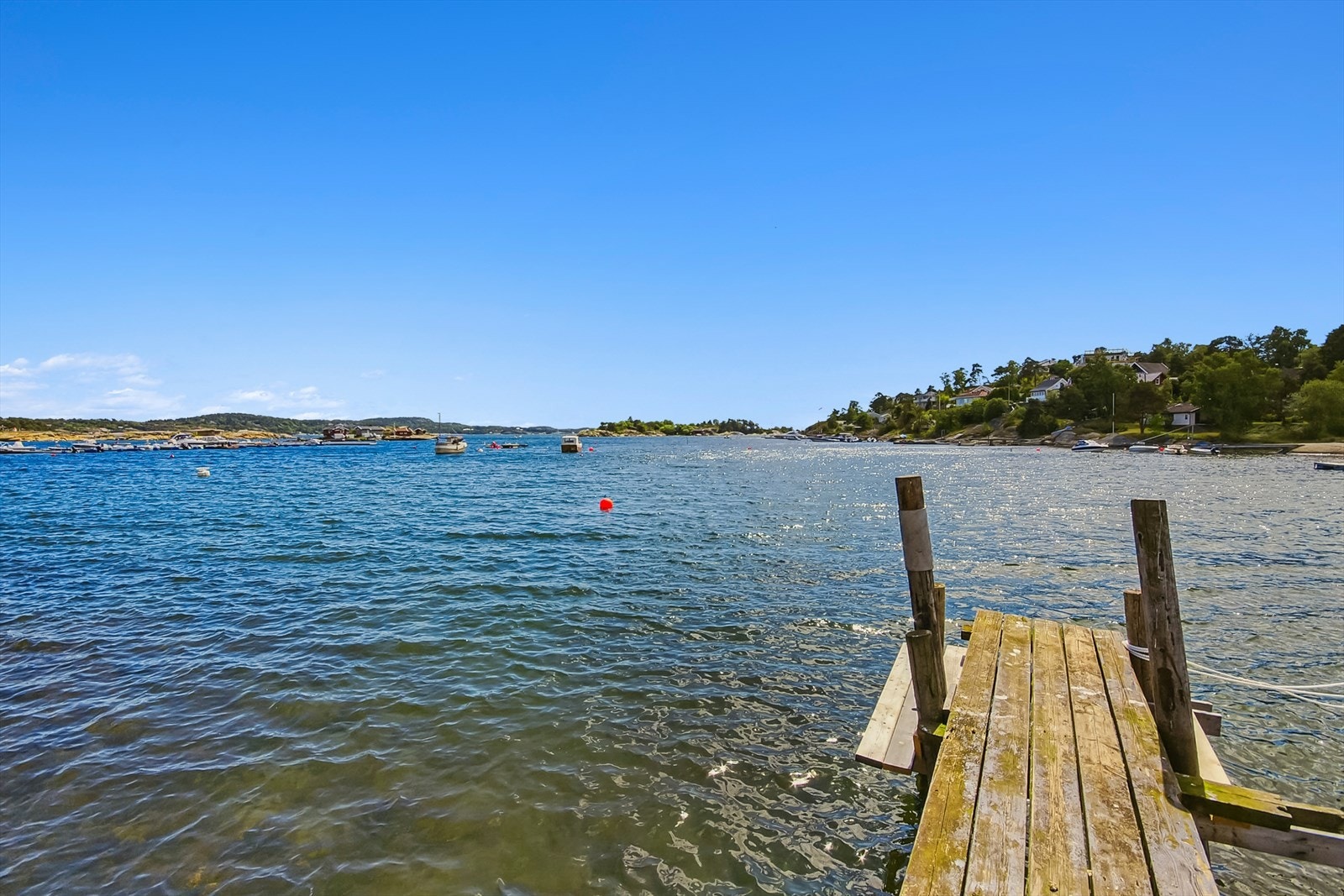 Kort vei fra leiligheten til flott badestrand Galleribilde
