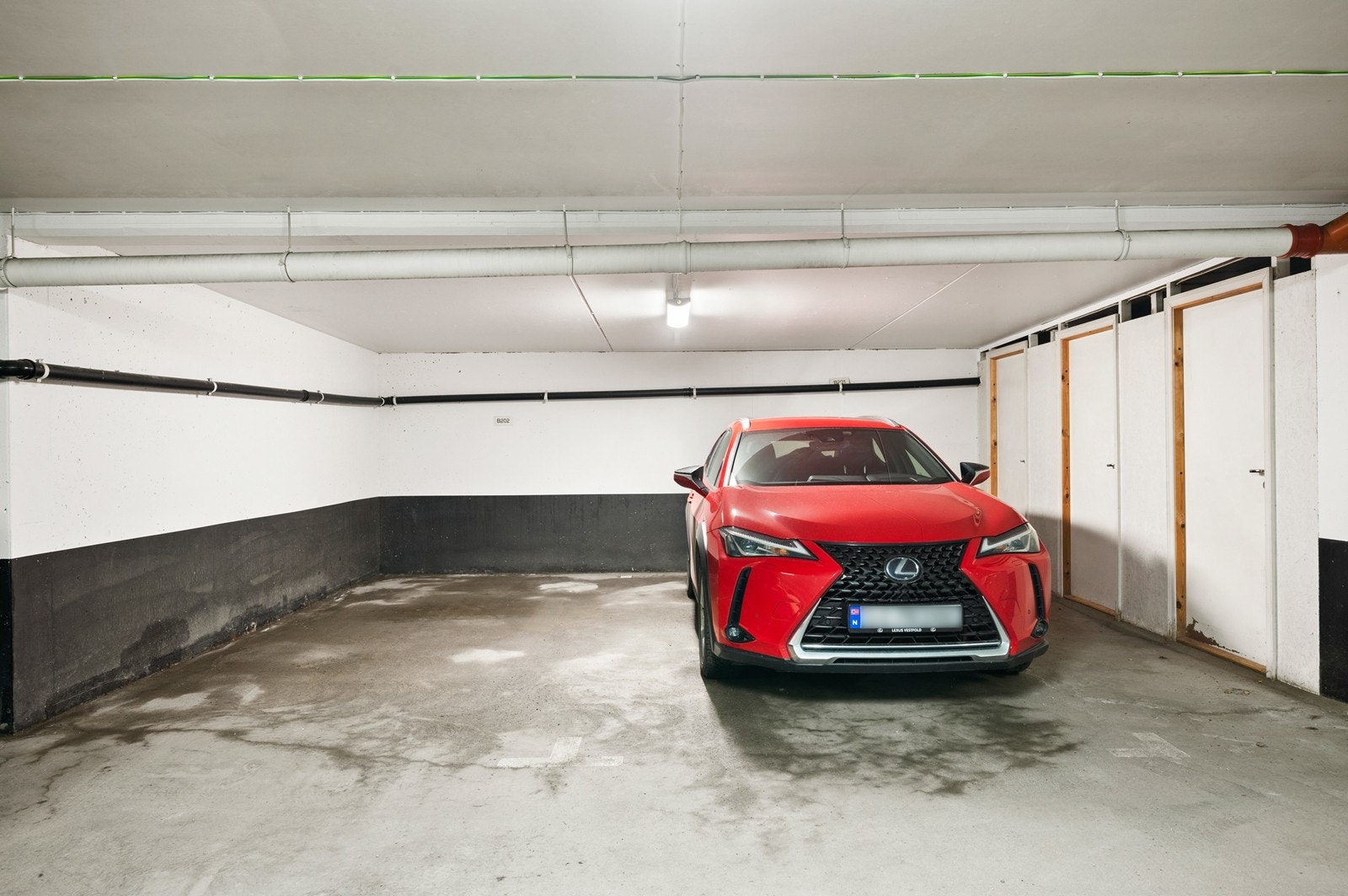 Parkeringsplassen som medfølger eiendommen Galleribilde