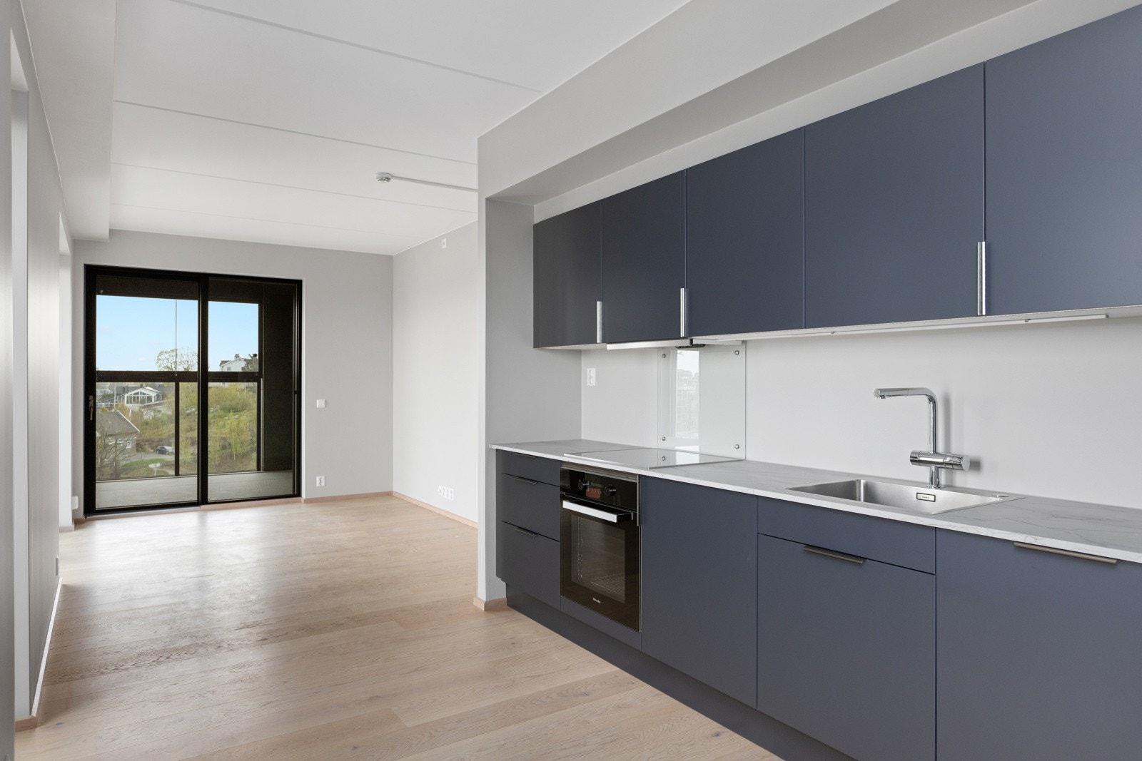 Lekkert kjøkken fra Sigdal med glatte fronter og soft-close funksjon. Galleribilde