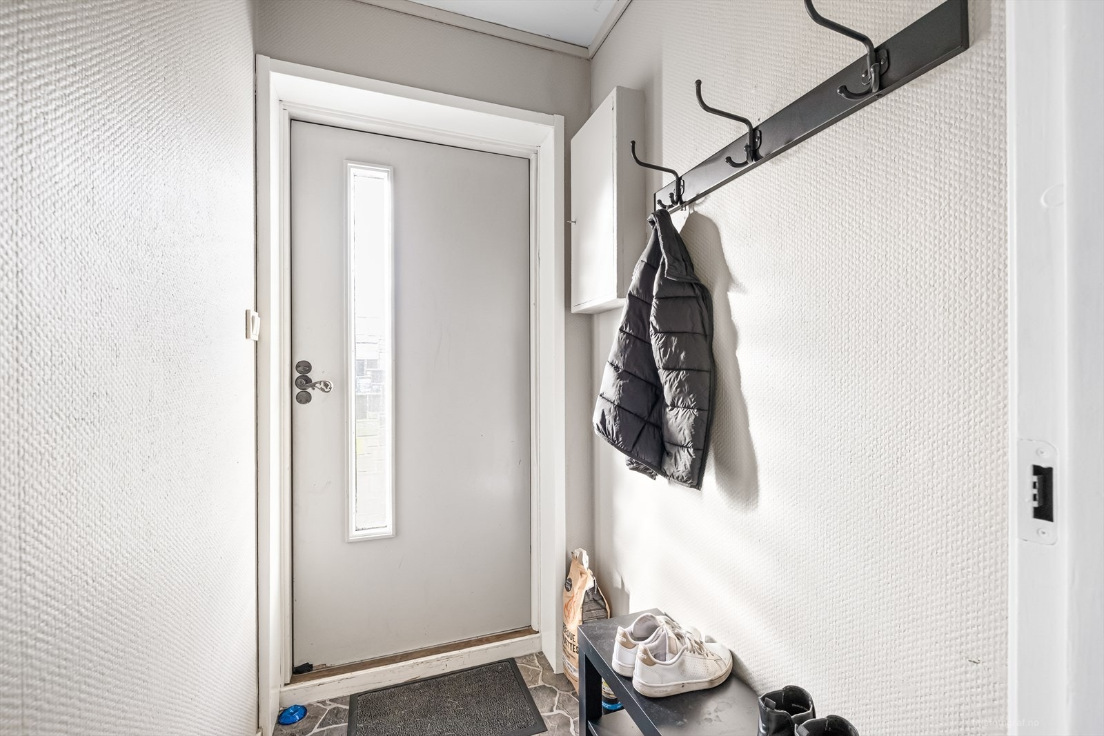 Inngangsparti i leiligheten. Galleribilde