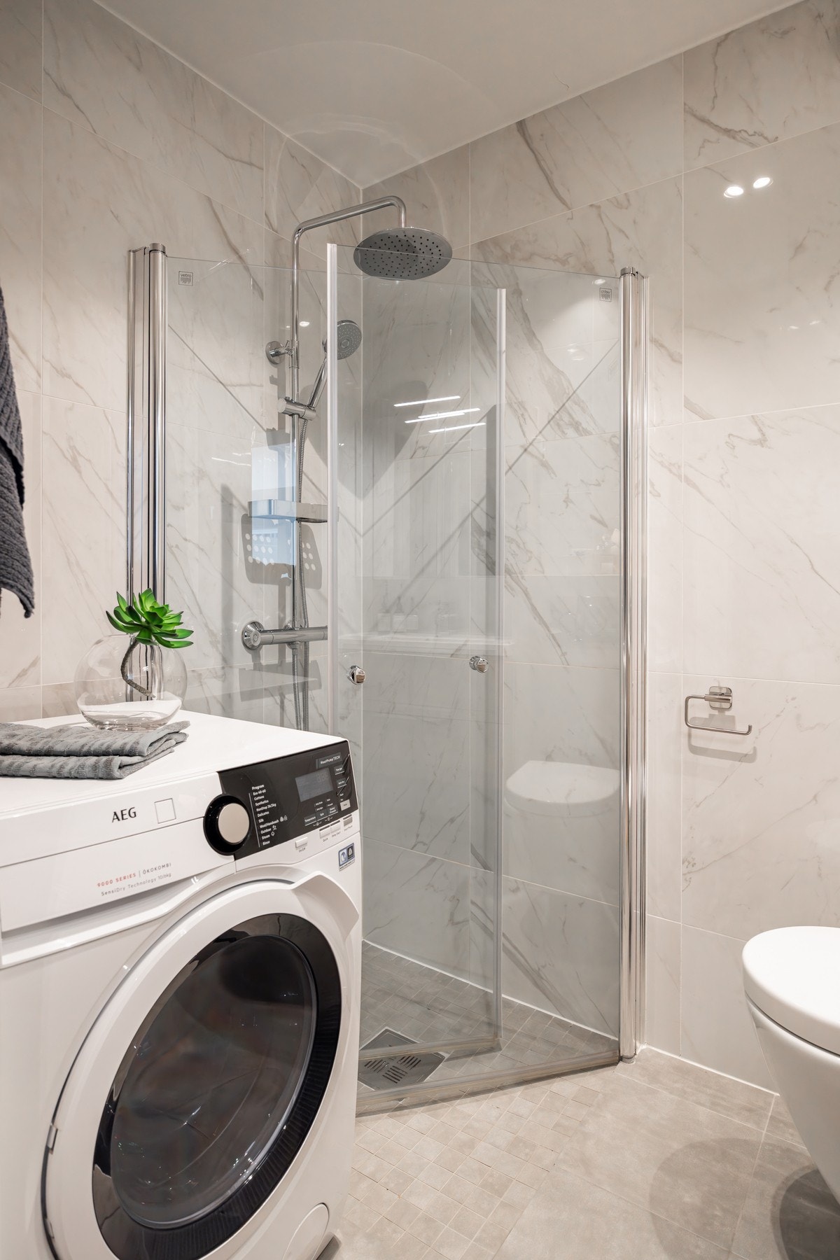 Opplegg for vaskemaskin. Det er også egen vaskekjeller i borettslaget. Galleribilde