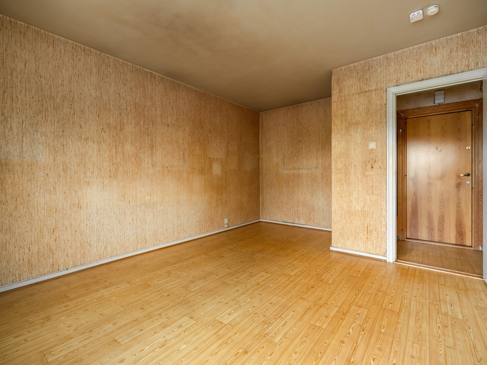 I flere av de andre leilighetene er kjøkkenet flyttet inn i stuen for å etablere et eget soverom. Galleribilde