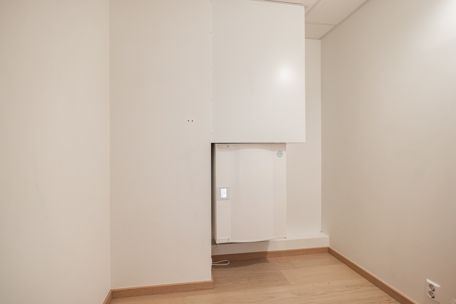 Et praktisk rom med god plass til smarte oppbevaringsmøbler. Galleribilde