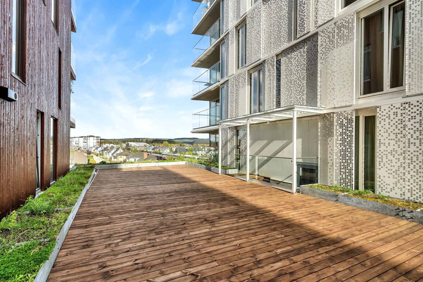 Felles takterrasse mellom byggene Galleribilde