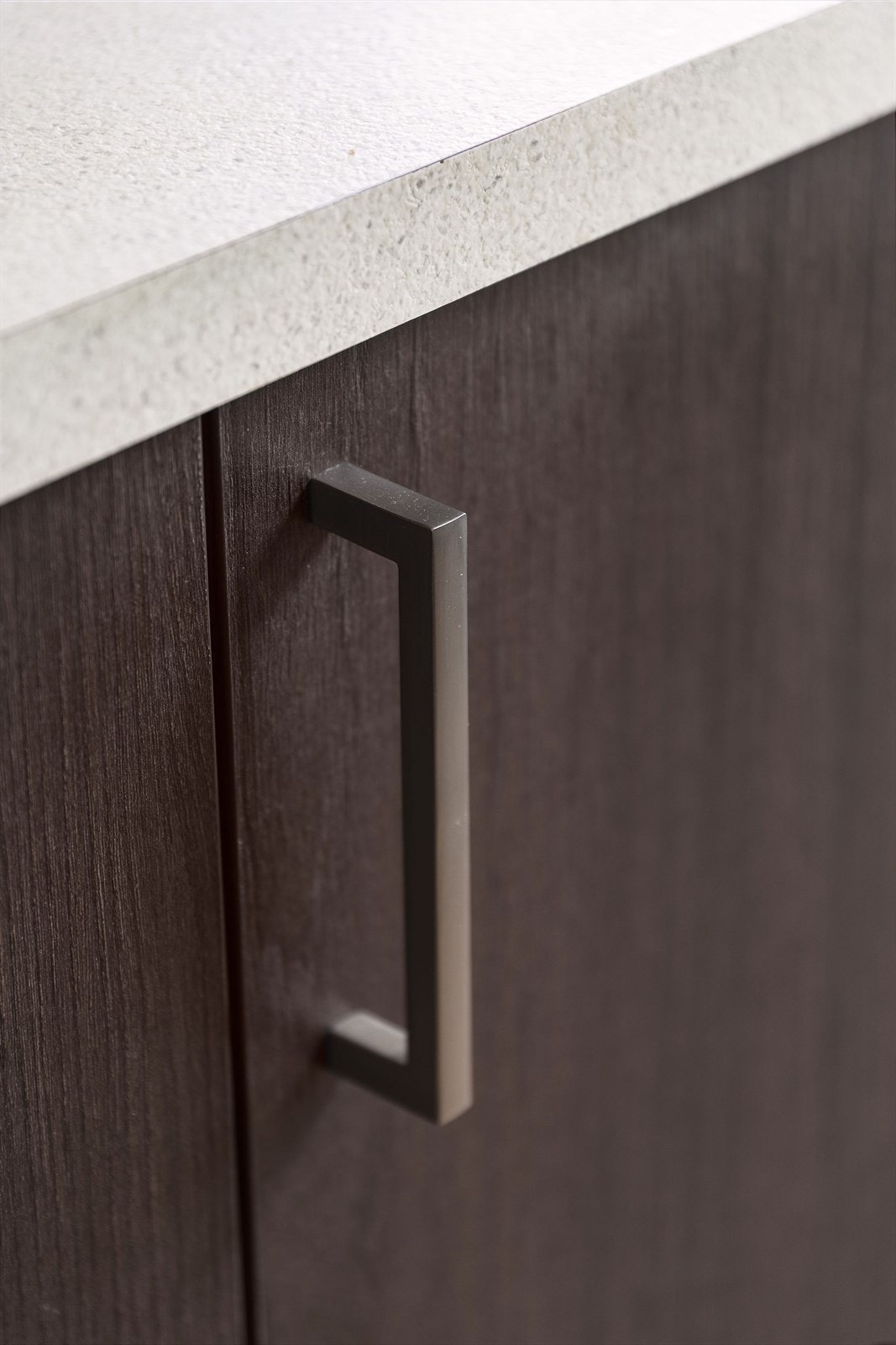 Norema kjøkkeninnredning med slette fronter og benkeplate av laminat. Galleribilde