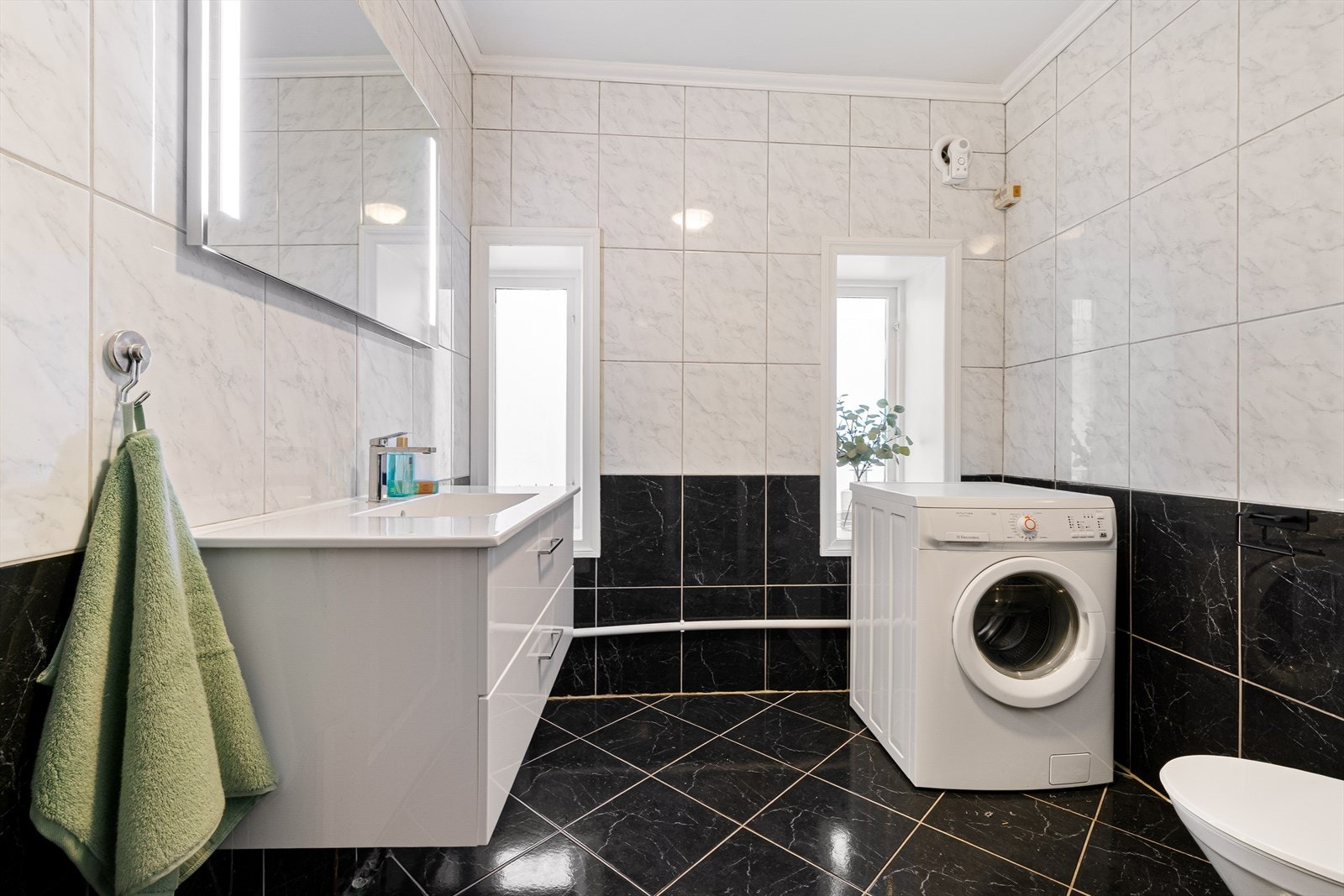 Varmekabler i gulvet sørger for en behagelig temperatur, uansett sesong. Galleribilde