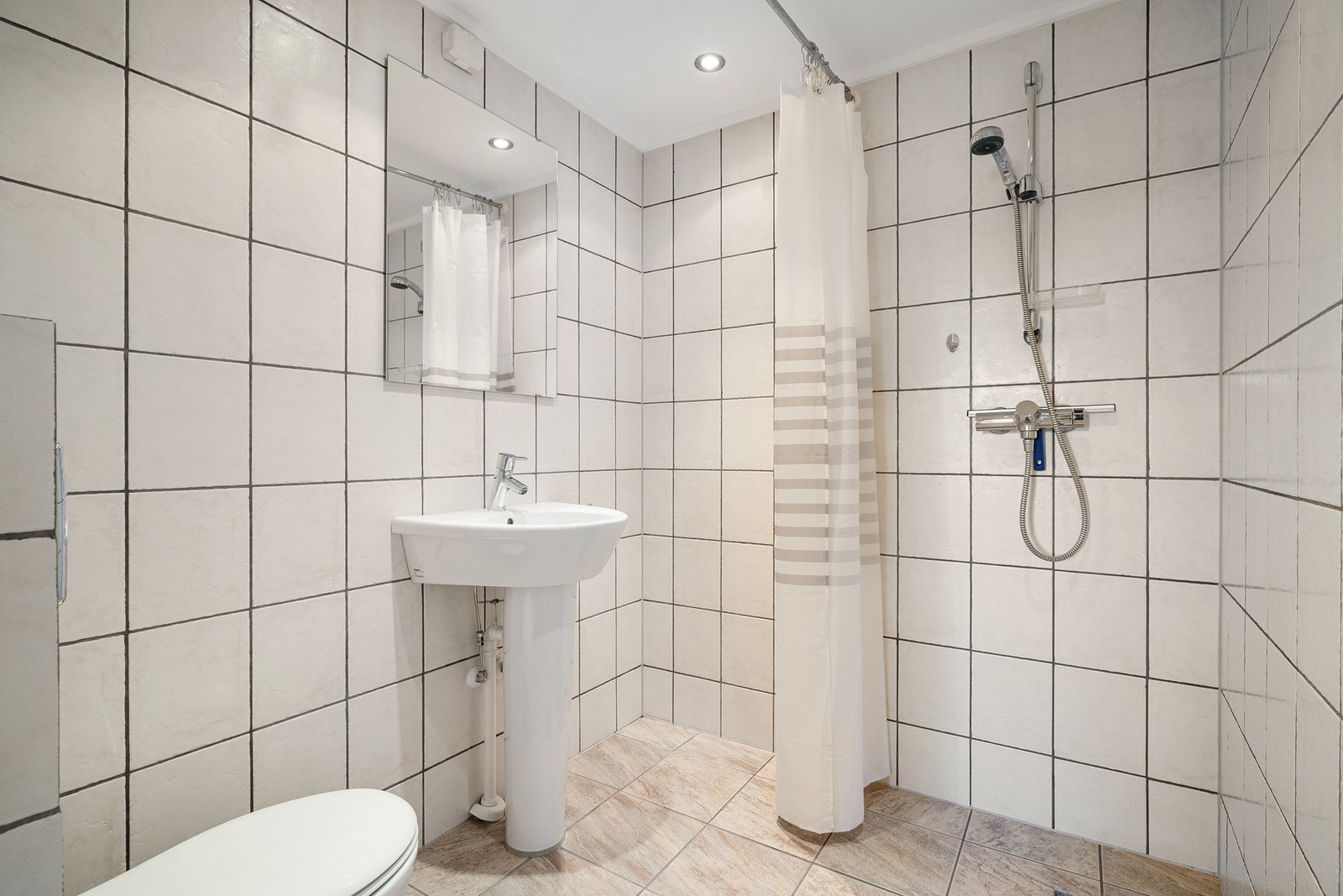 Flislagt dusjbad. Galleribilde