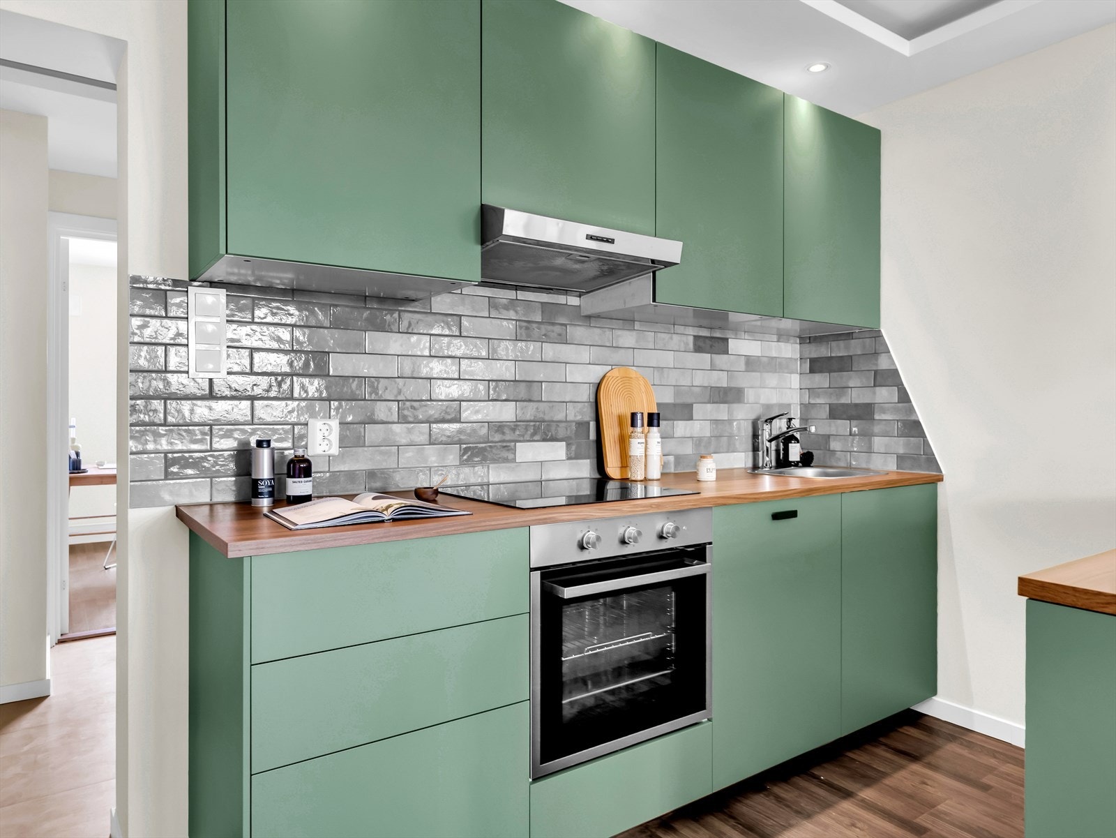 Over platetoppen er det tilkoblet kullfiltervifte. Galleribilde