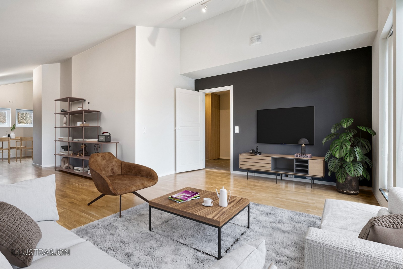 Leiligheten har en lys og innbydende stue med generøs takhøyde Galleribilde