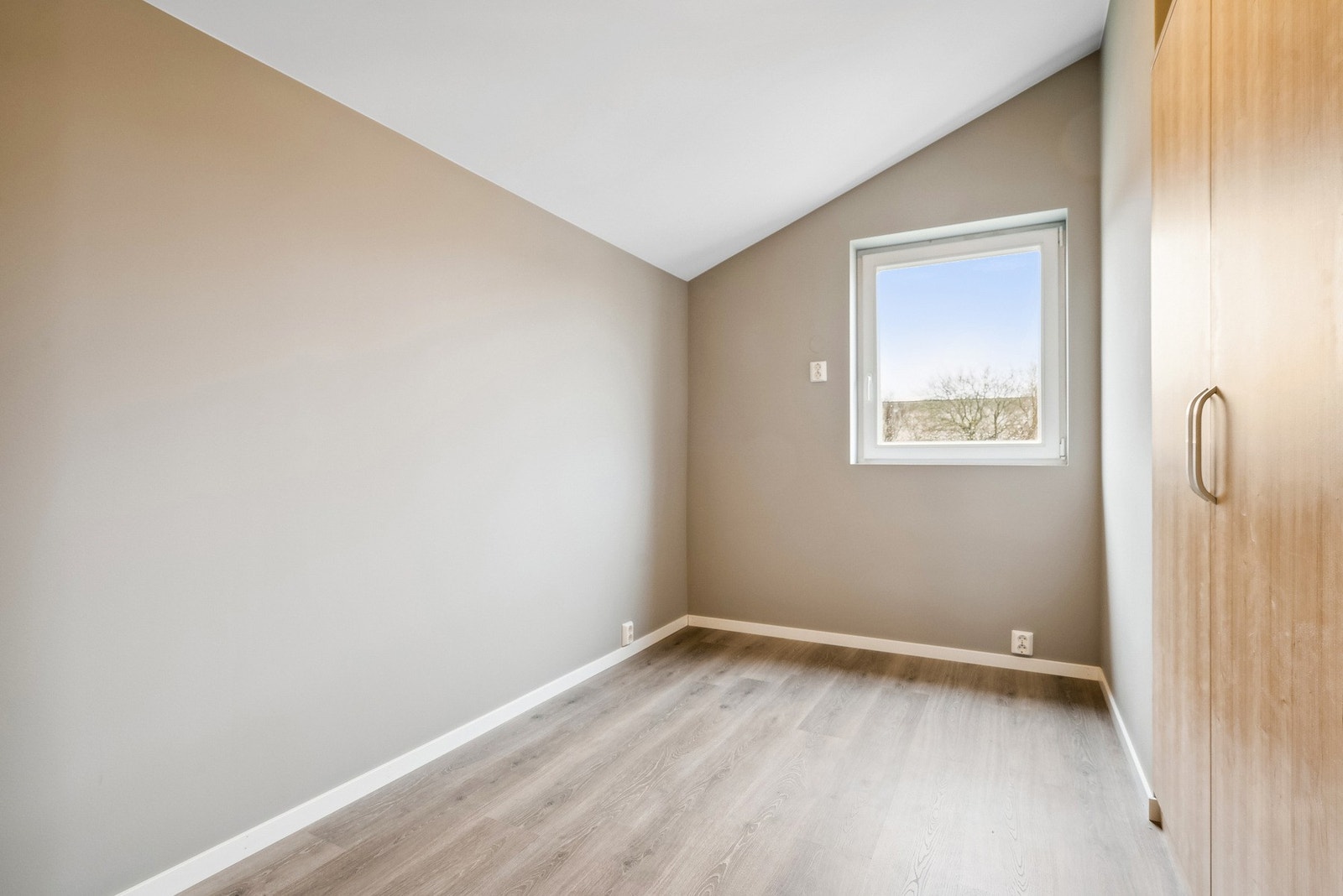 Leiligheten har gjennomgående delikate fargevalg Galleribilde