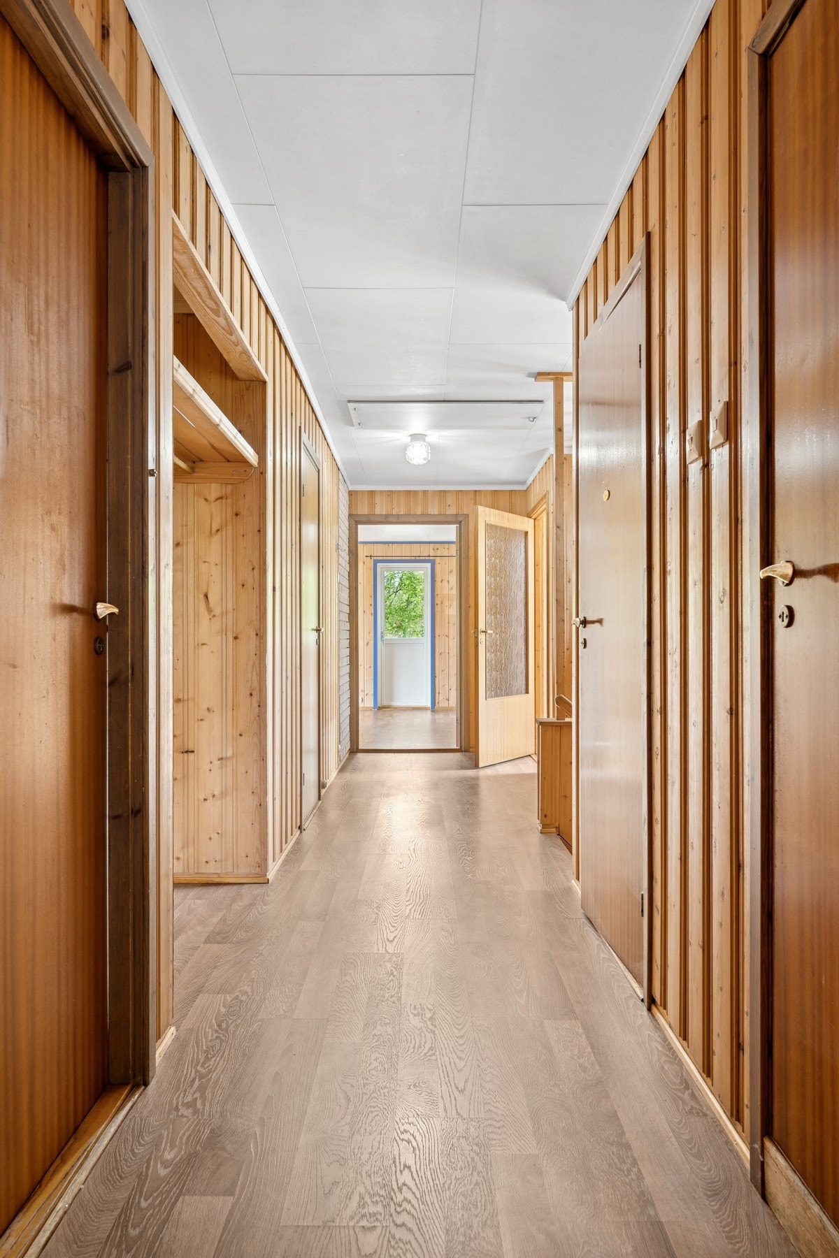 Gangen tar deg videre til boligens kjøkken og stue. Galleribilde