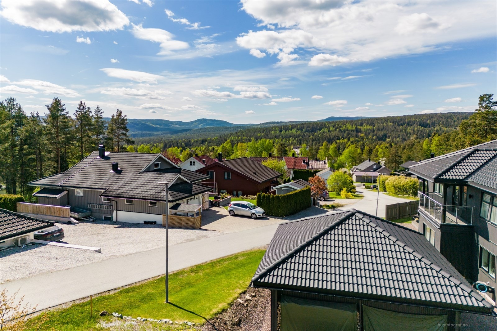 Bildet viser utsikt og er skissert fa ca. 2. etg. Galleribilde