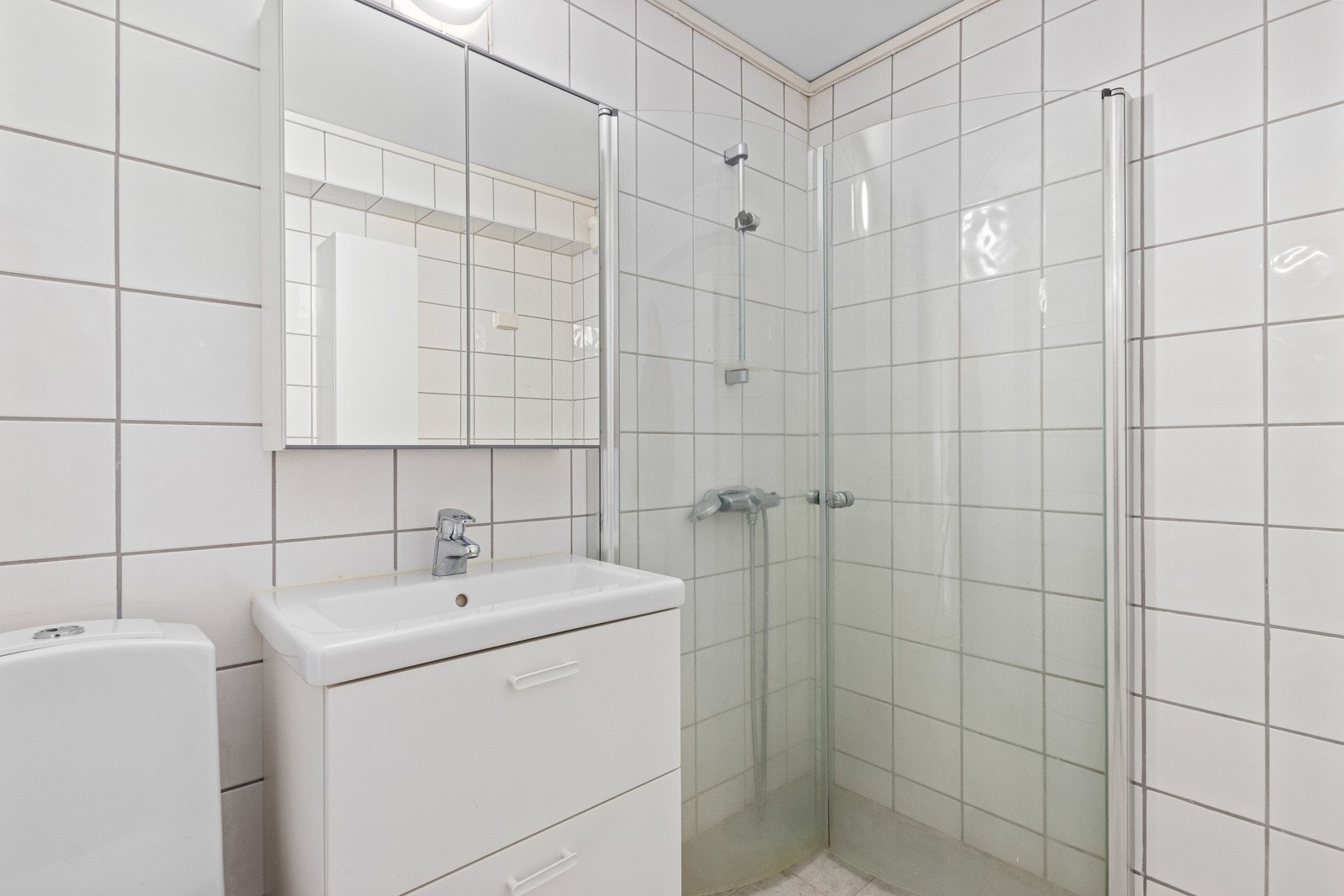 Flislagt bad med gulvvarme. Galleribilde