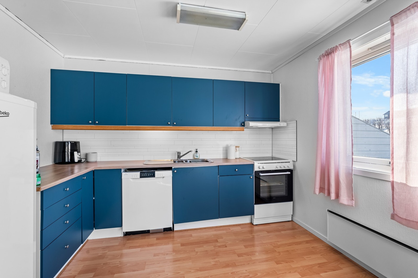 Kjøkkenet i leiligheten er fra byggetiden Galleribilde