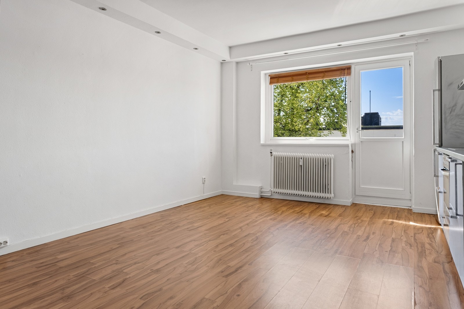 Stuen og kjøkkenet er en hyggelig, sosial sone. Galleribilde