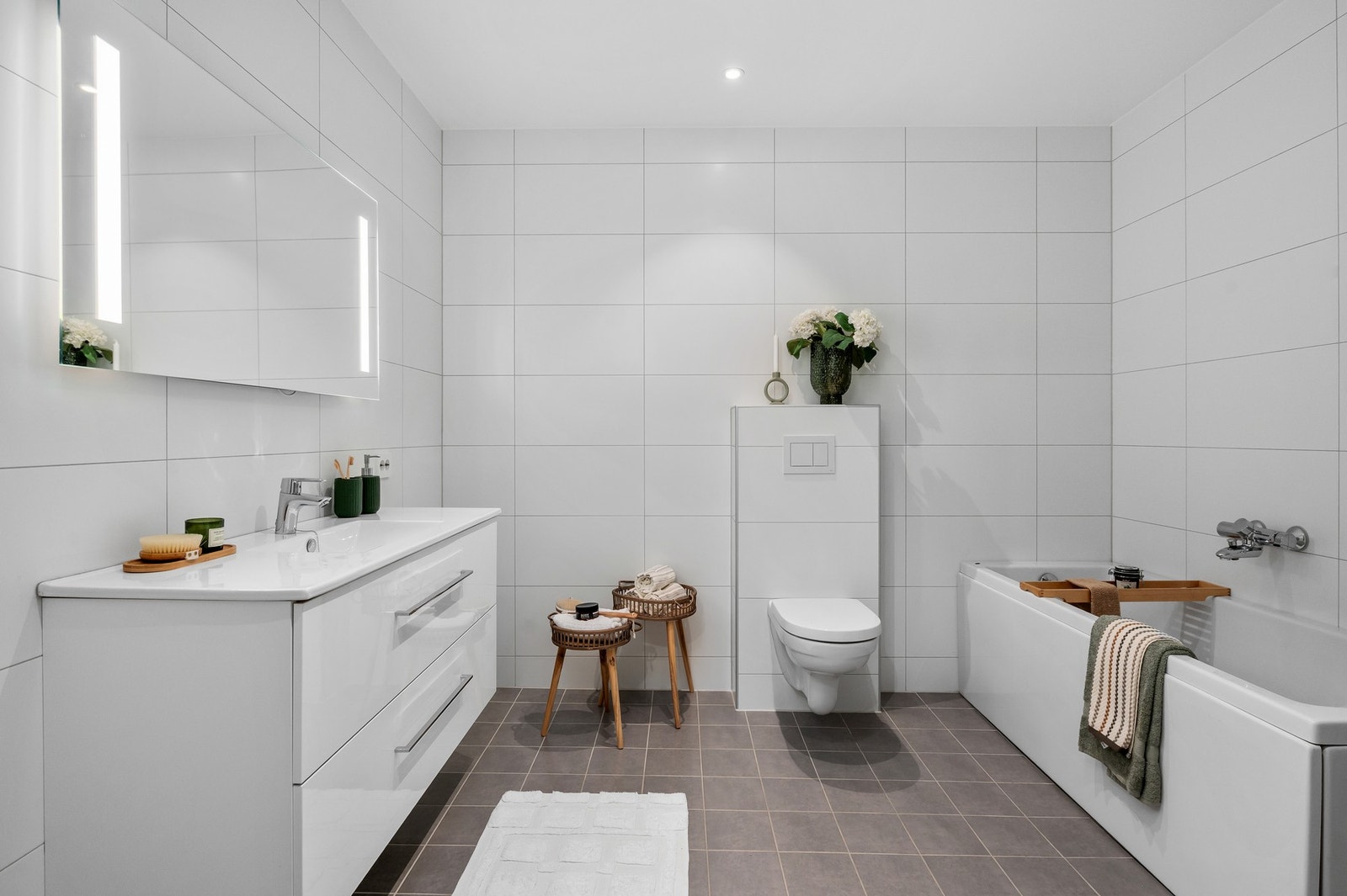 Moderne og flislagt baderom, som har fått TG1 av takstmann. Galleribilde