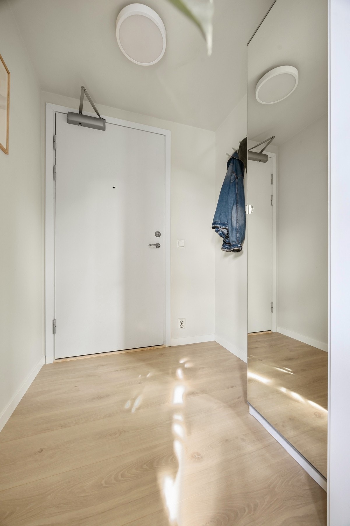 Lys og innbydende entré. Galleribilde