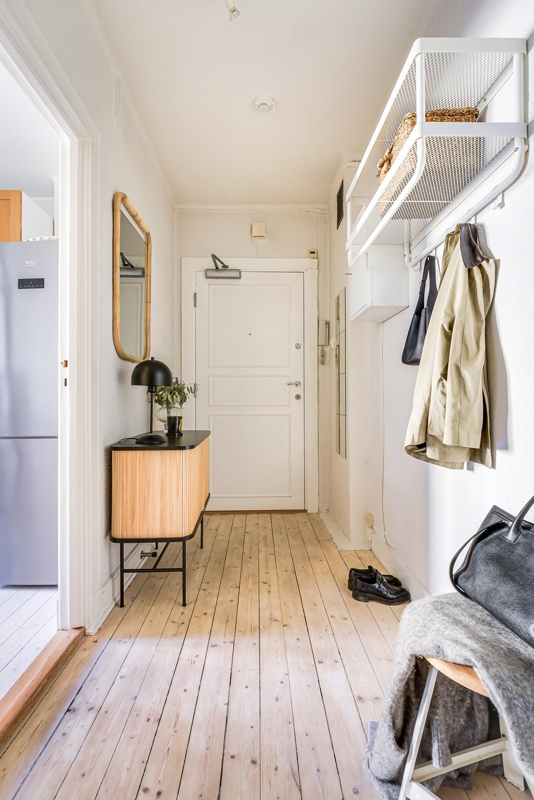 Entréen gir et godt førsteinntrykk, og er et fint første møte med denne sjarmerende leiligheten. Galleribilde