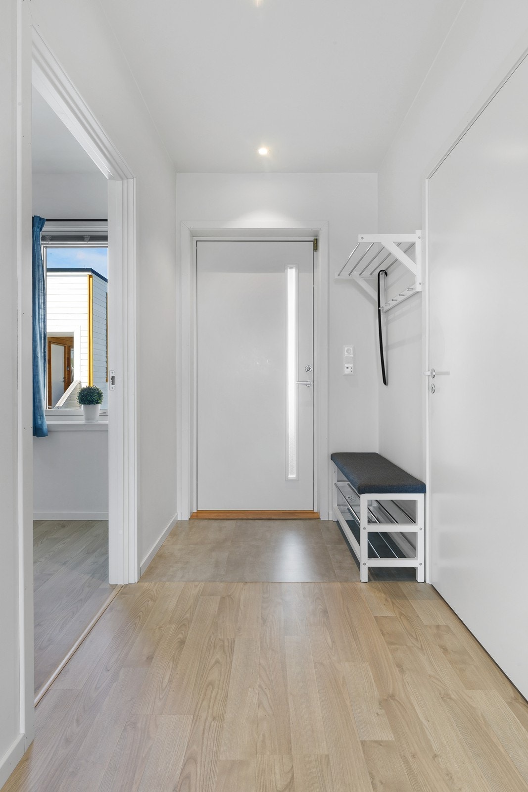 Velkommen inn til et hyggelig inngangsparti! Galleribilde