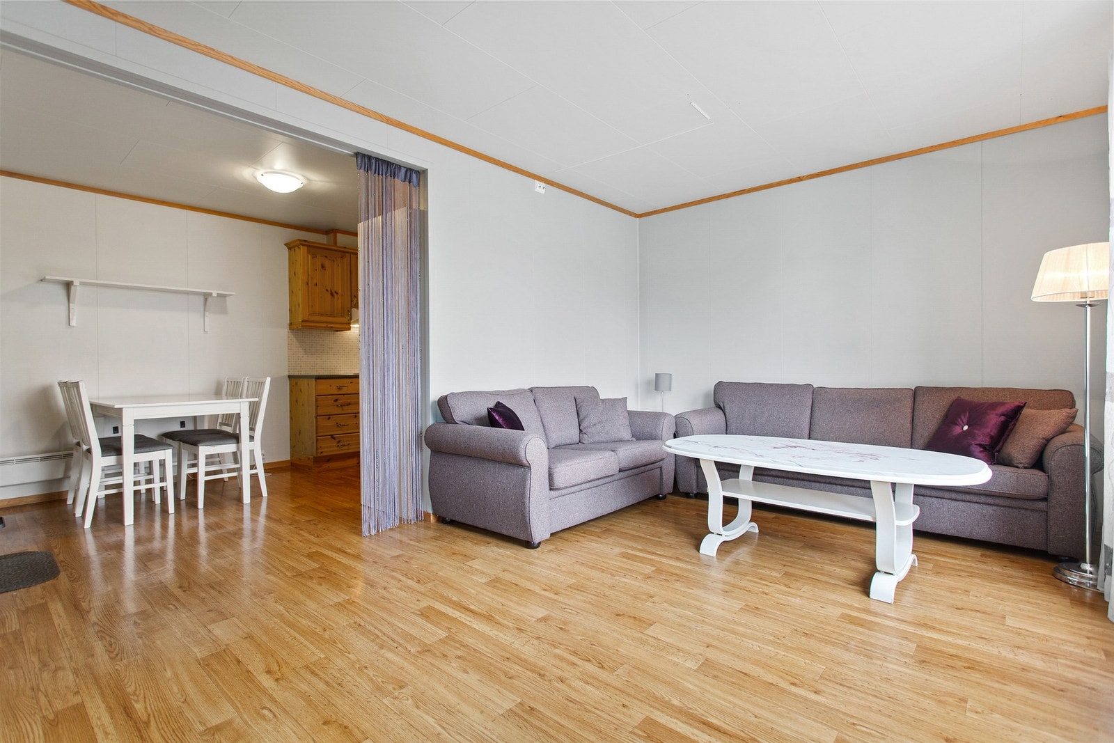 Stuen i utleiedel har plass til sofagruppe. Galleribilde
