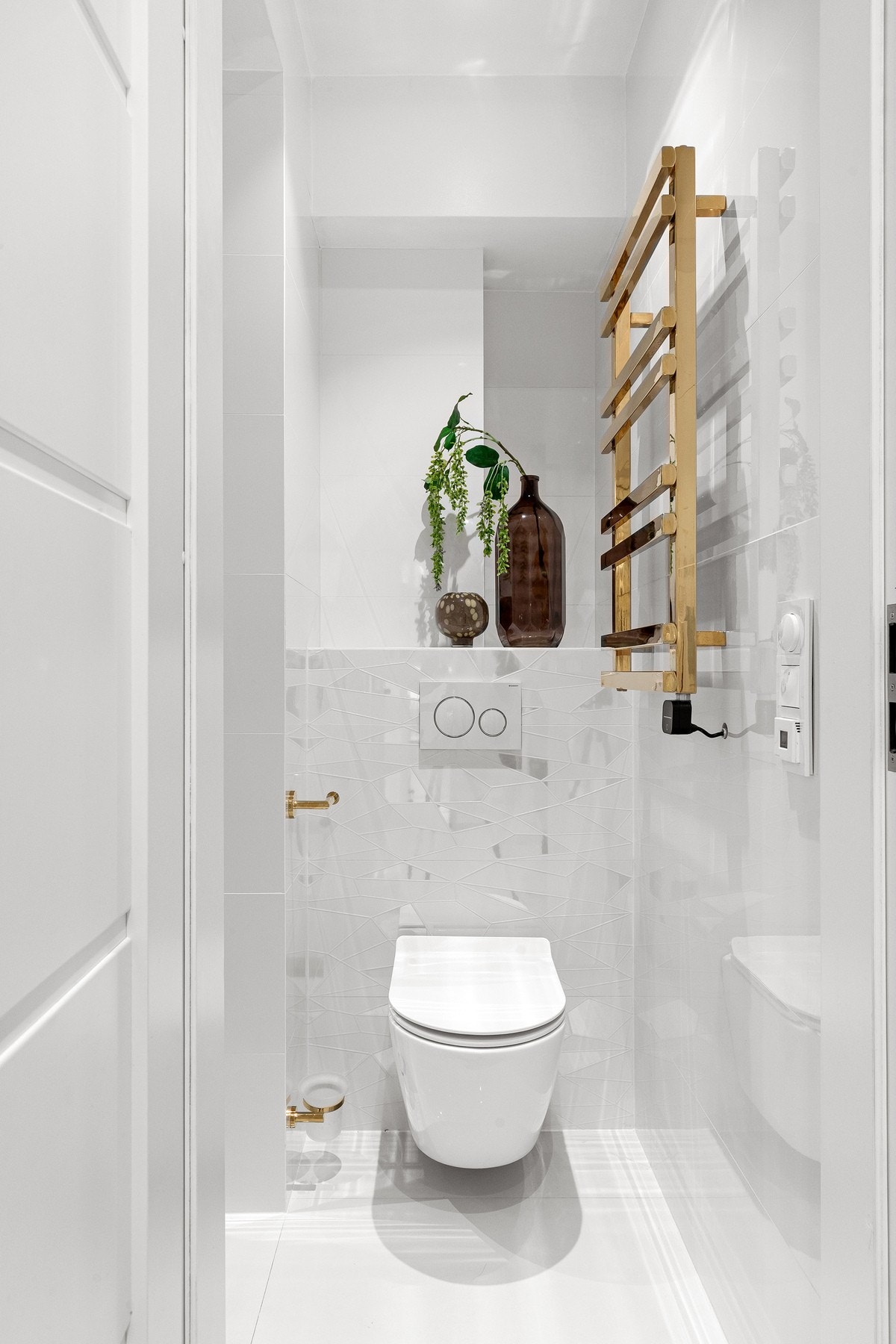 Manglende funksjon tilknyttet elektrisk håndkletørker vil utbedres før overtagelse. Galleribilde