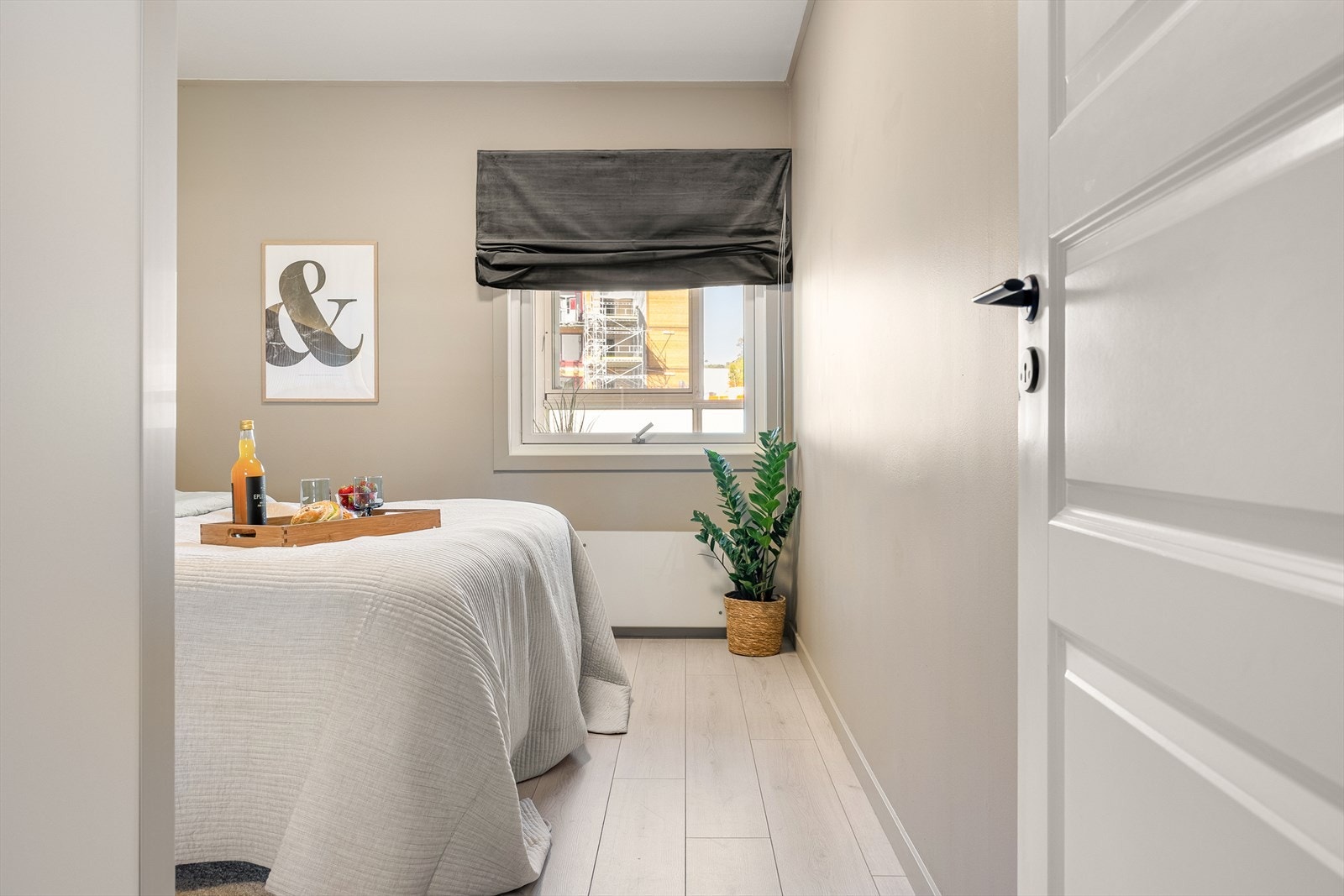 Leilighetens soverom har et areal på 11,5 m². Galleribilde