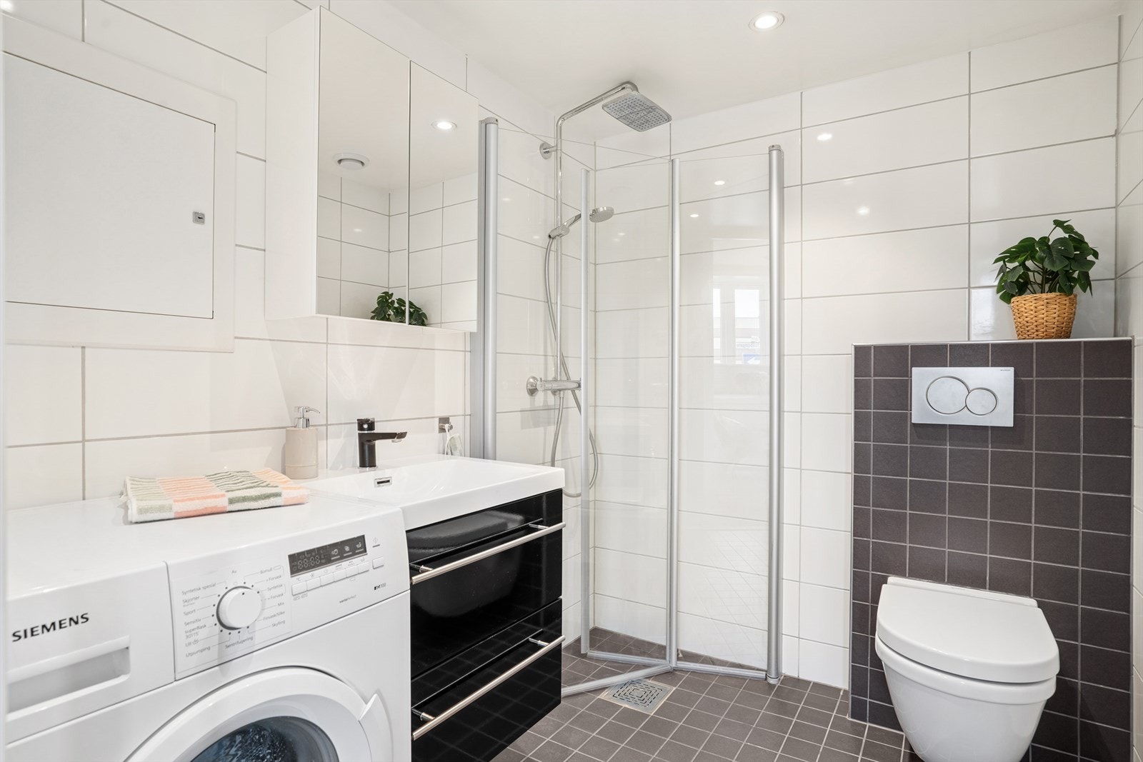 Flislagt bad med varme i gulv. Galleribilde