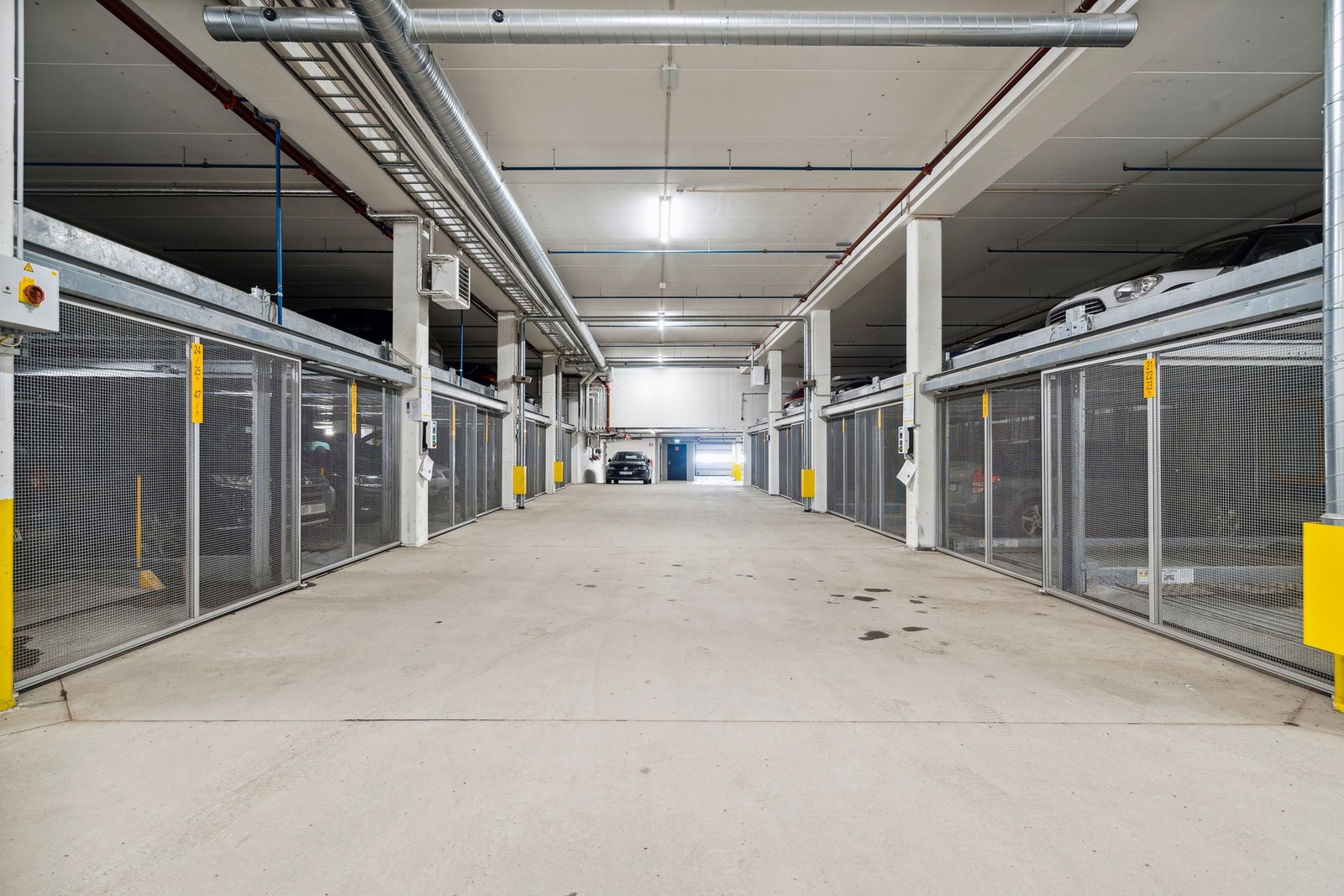 Det medfølger en parkeringsplass med elbillader i felles garasjeanlegg Galleribilde