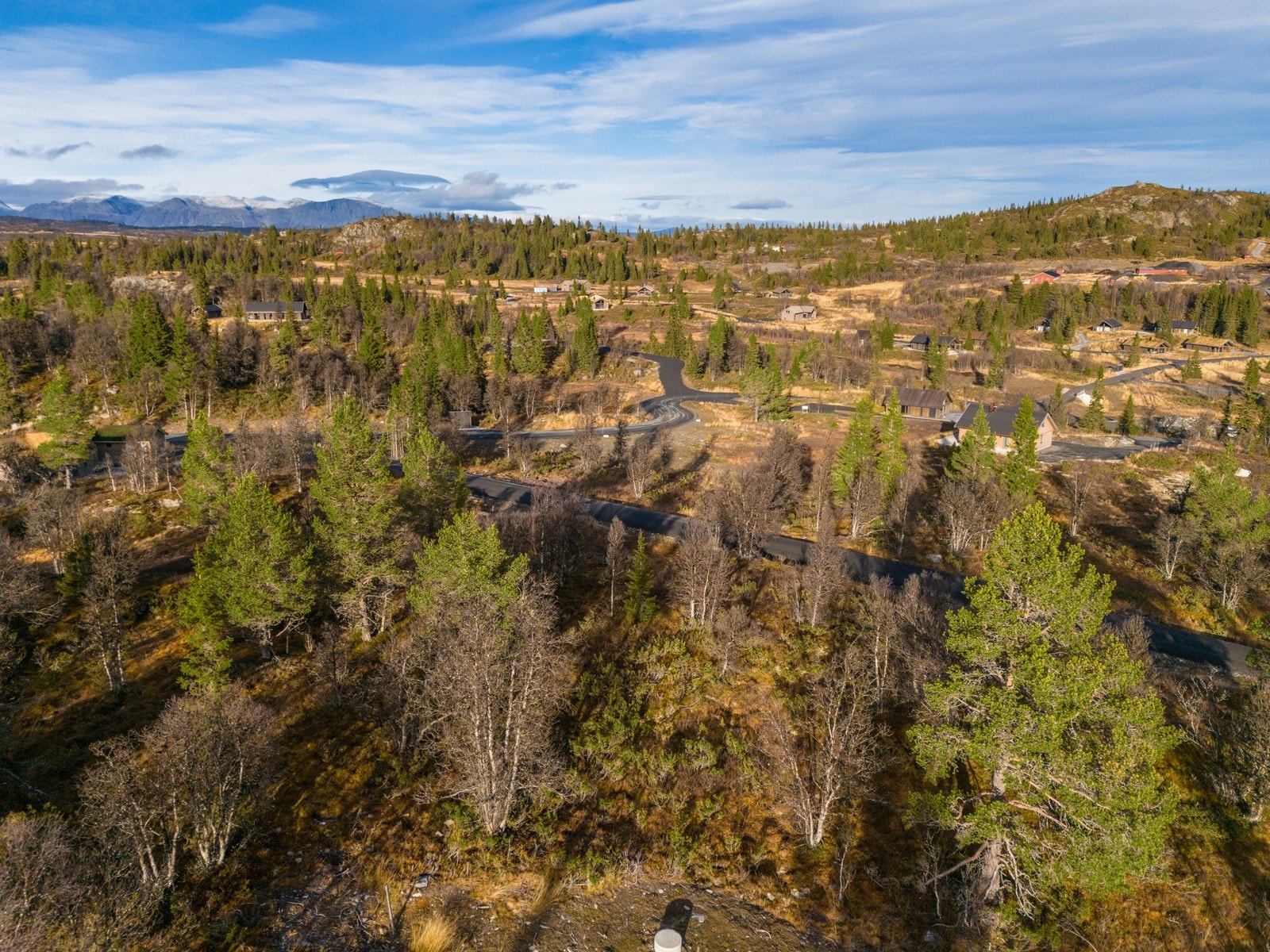 Vinterparadis med utsikt mot snøkledde topper. Galleribilde