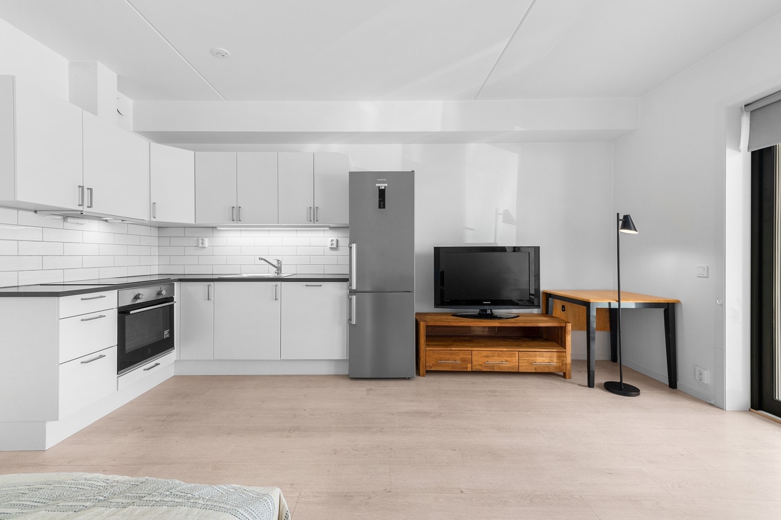 Stue og kjøkken i åpen løsning Galleribilde