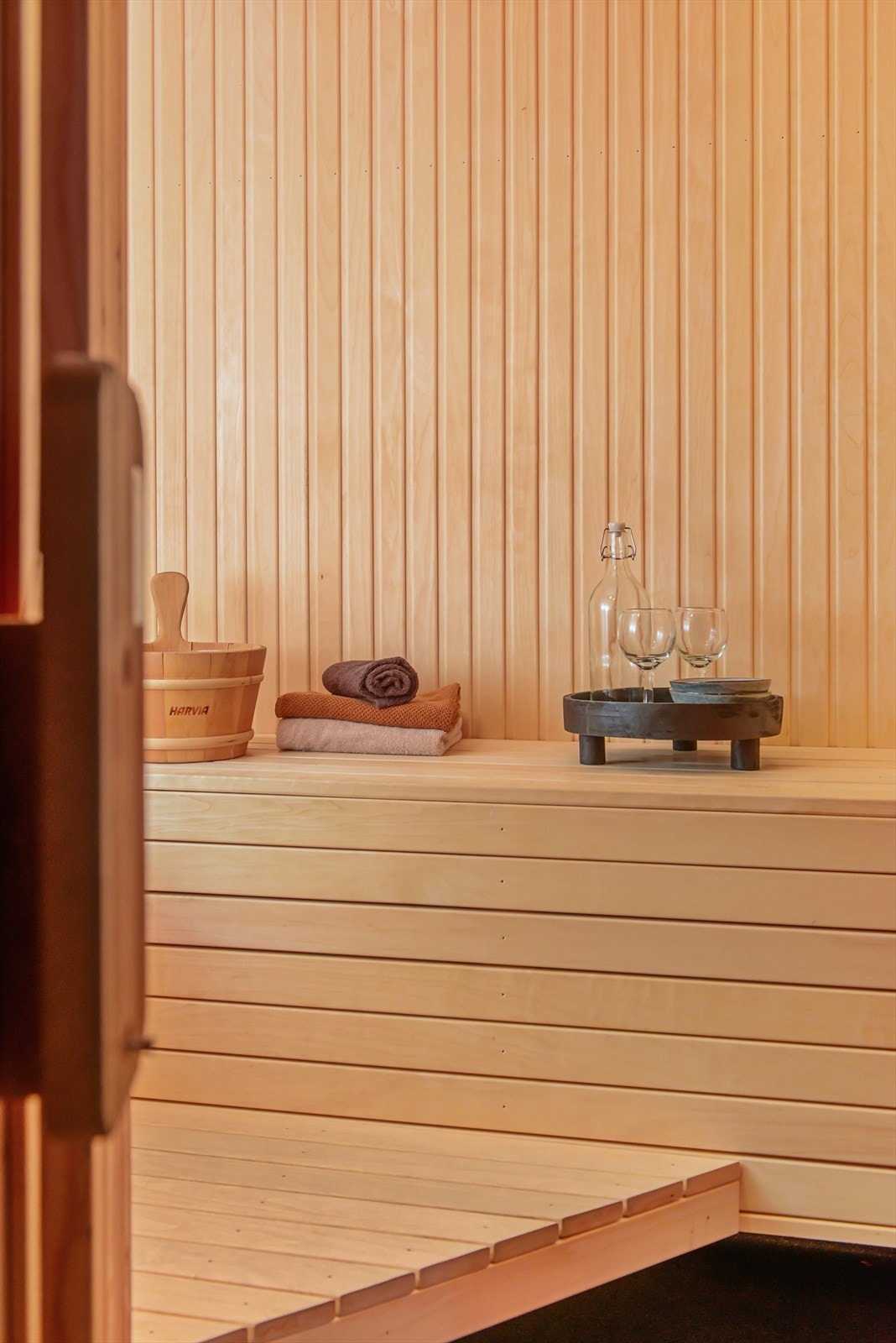 Sett deg i en varm badstue etter en lang dag i bakken. Galleribilde