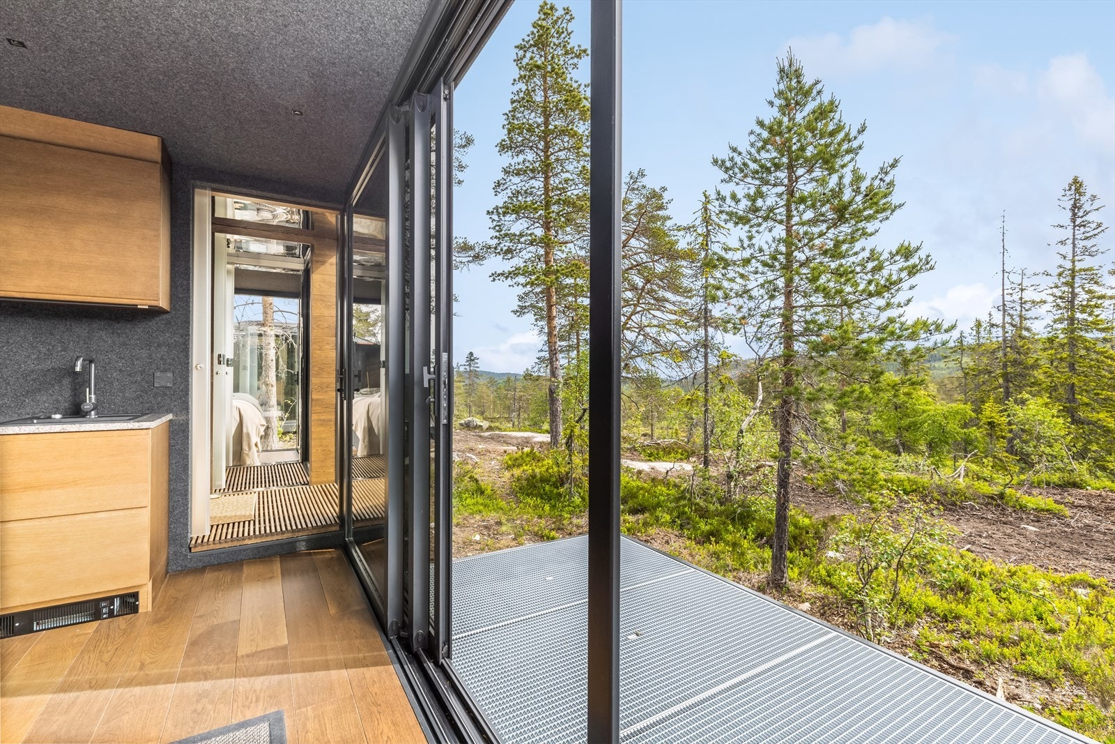 Her får du naturen rett inn i hytta. Galleribilde