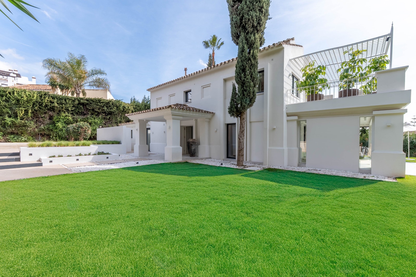 Her leker du med barna dine på gresset. Galleribilde