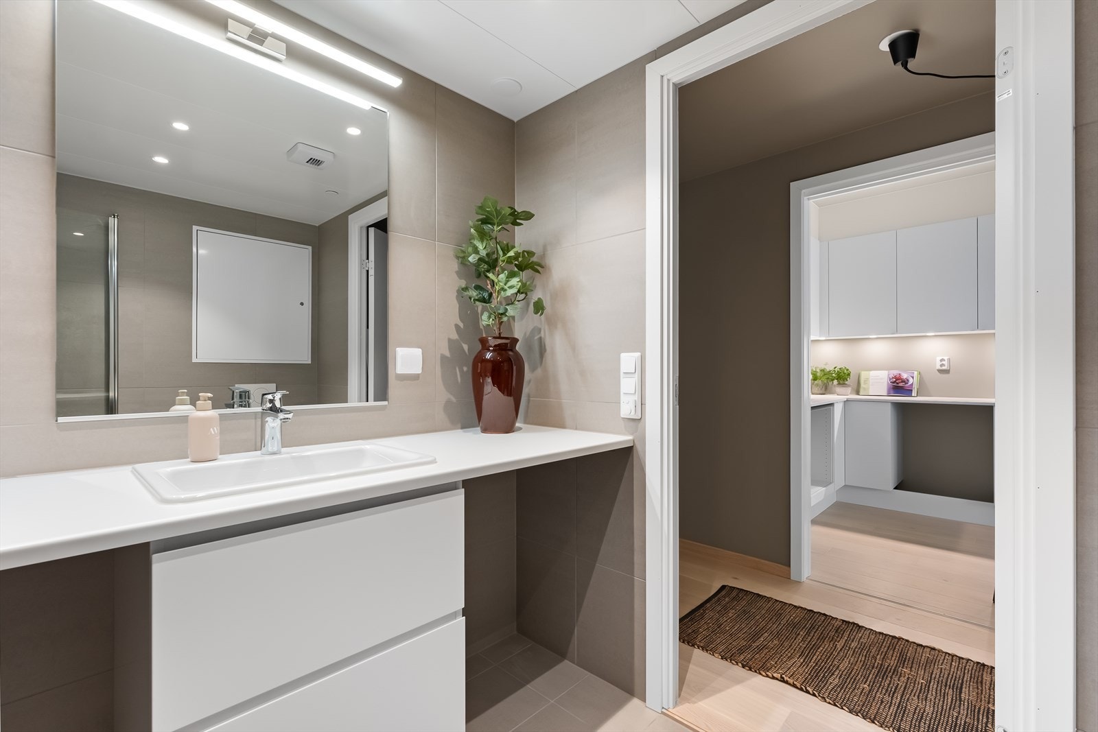 Flislagt bad med gulvvarme. Galleribilde