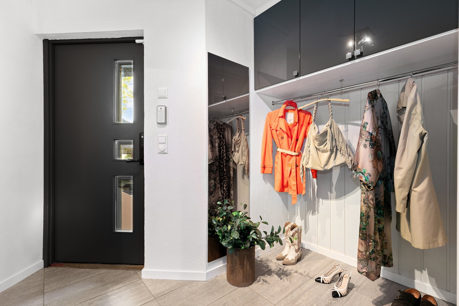 Gode oppbevaringsløsninger gjør det enkelt å holde gangen ryddig og ren. Galleribilde