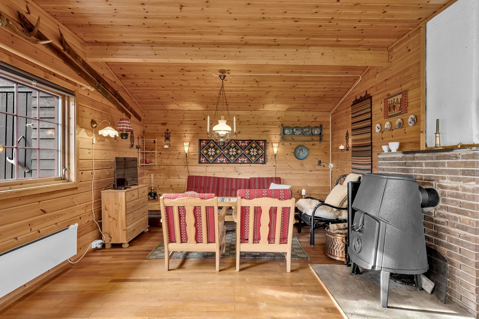 Sittegruppe og vedovn Galleribilde