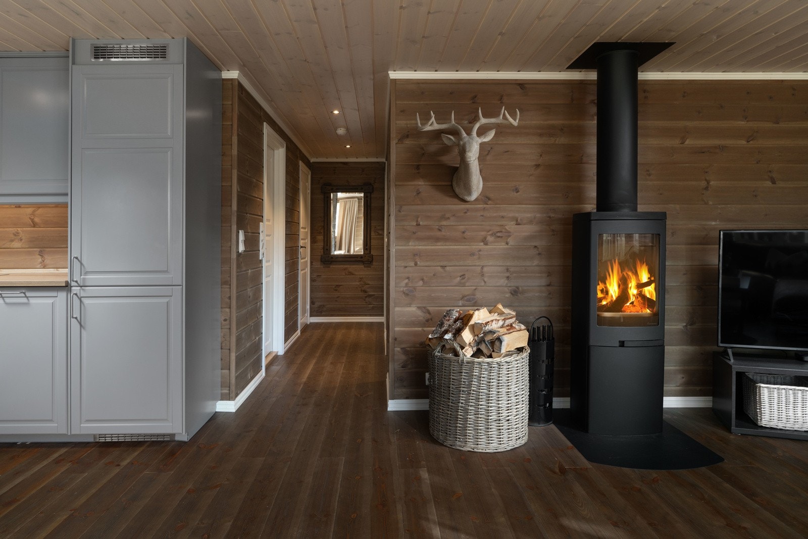 Peisovn som gir god varme i hele allrommet Galleribilde