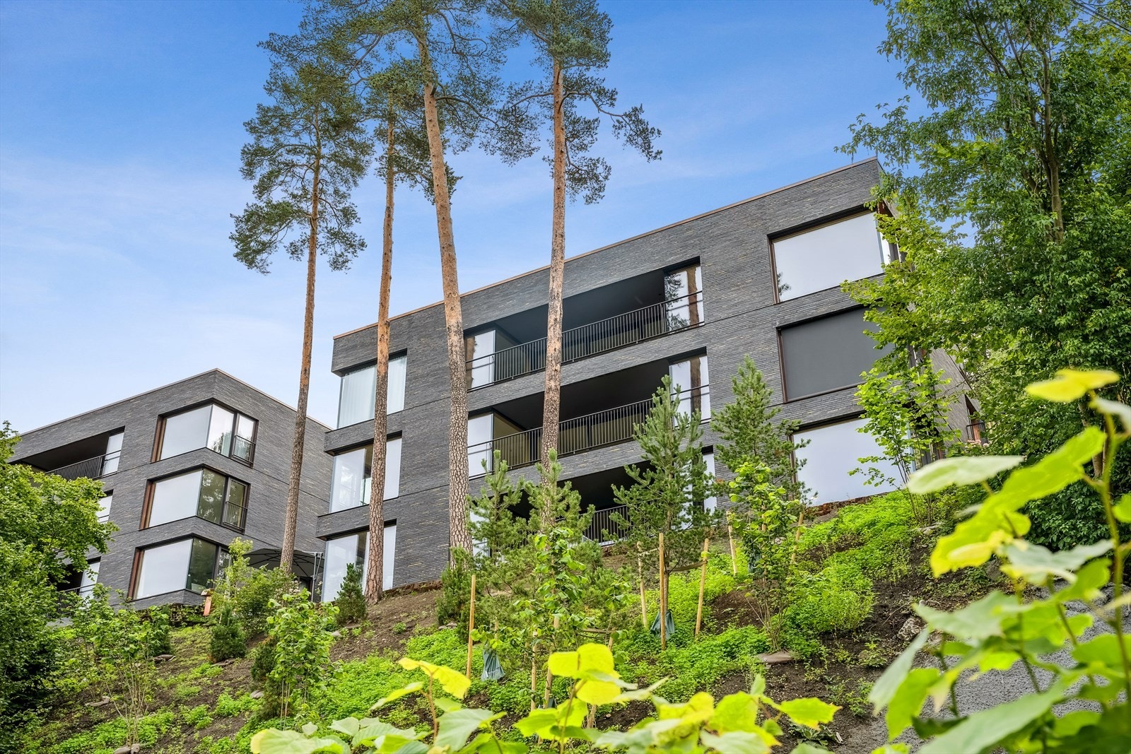 Fasader av eksklusiv KOLUMBA K58 teglstein fra Petersen Tegl med beslag av kobber Galleribilde