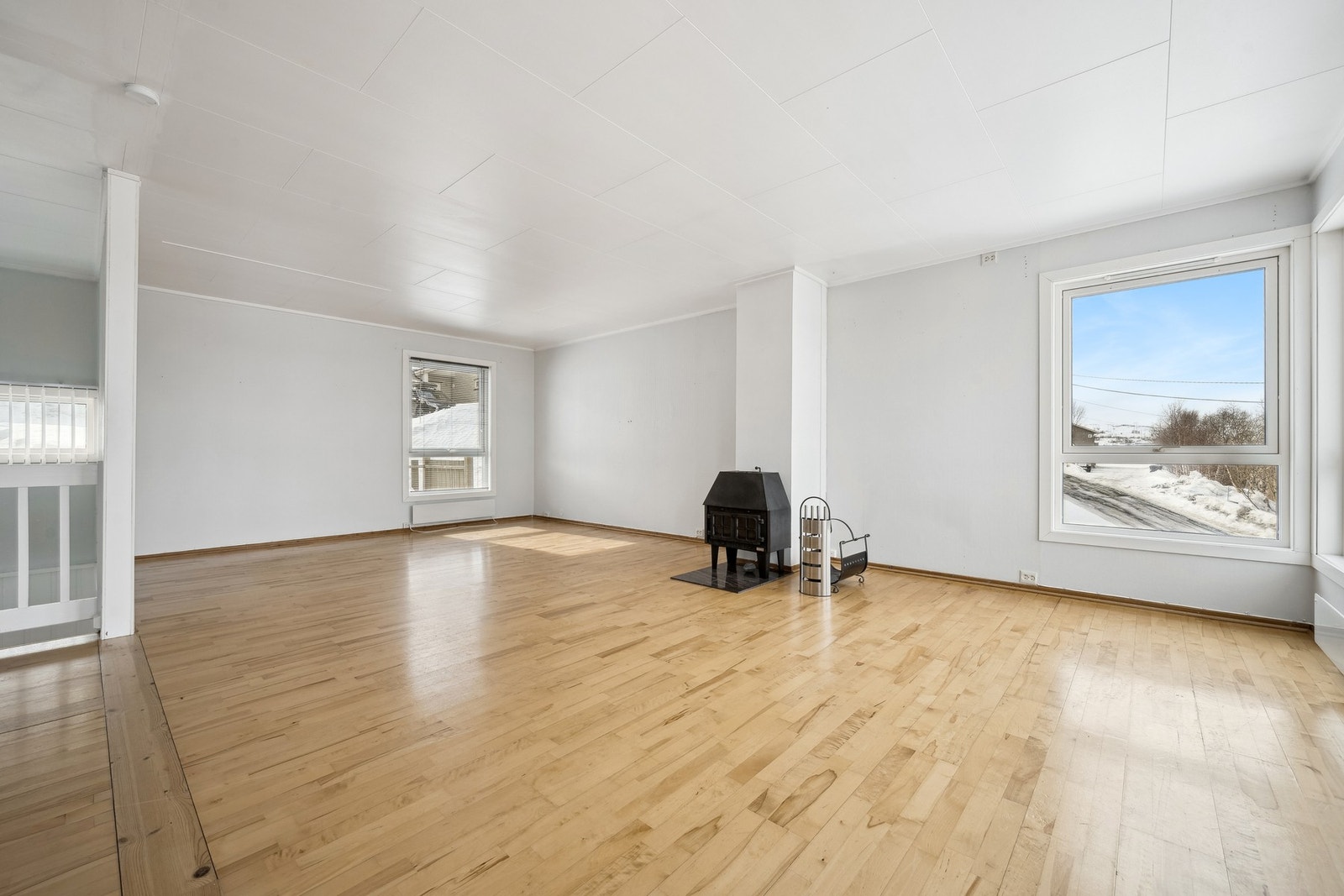 Det er også plassert vedovn i stuen Galleribilde